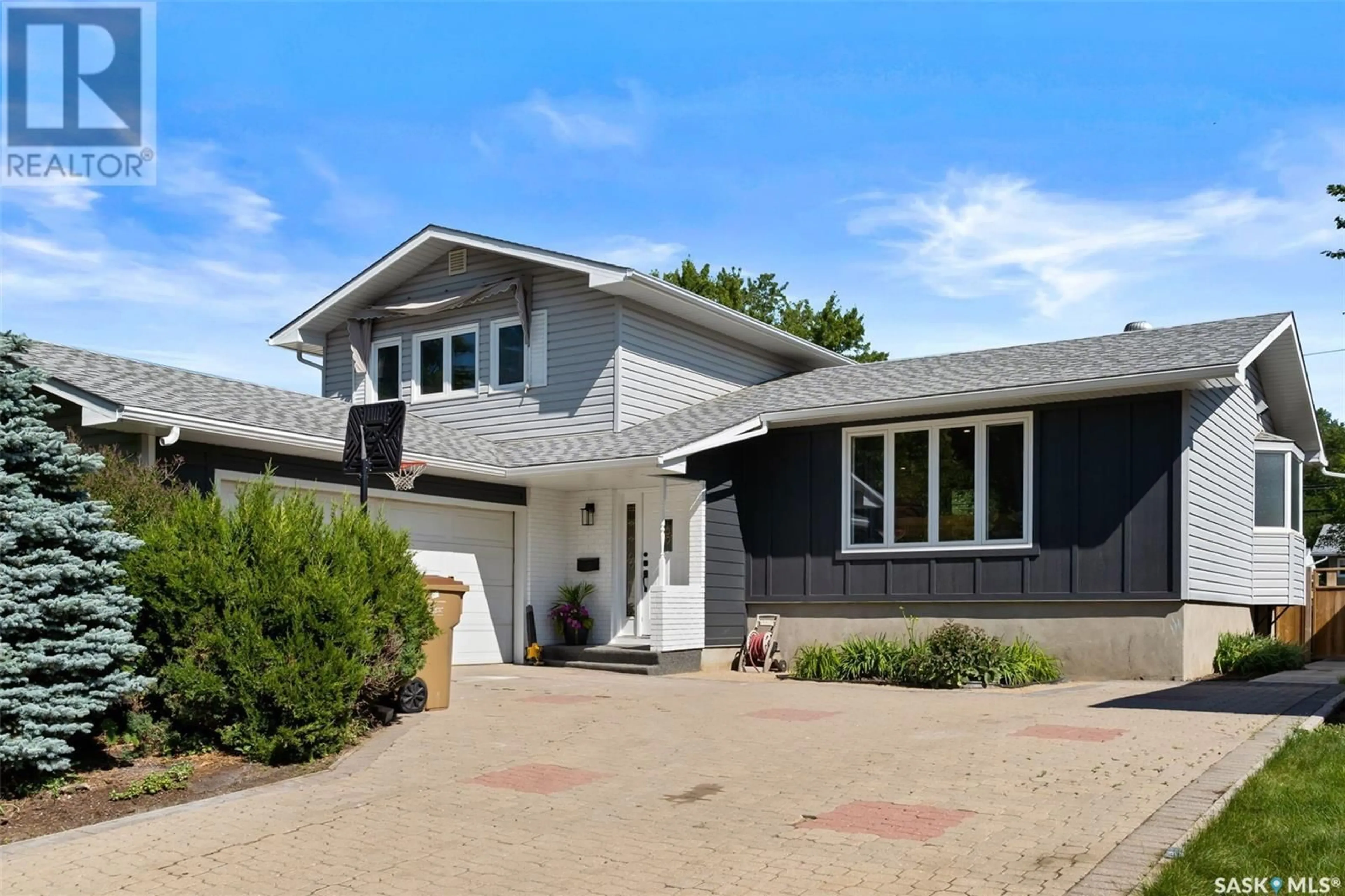Home with brick exterior material, street for 208 HABKIRK DRIVE, Regina Saskatchewan S4S2X8
