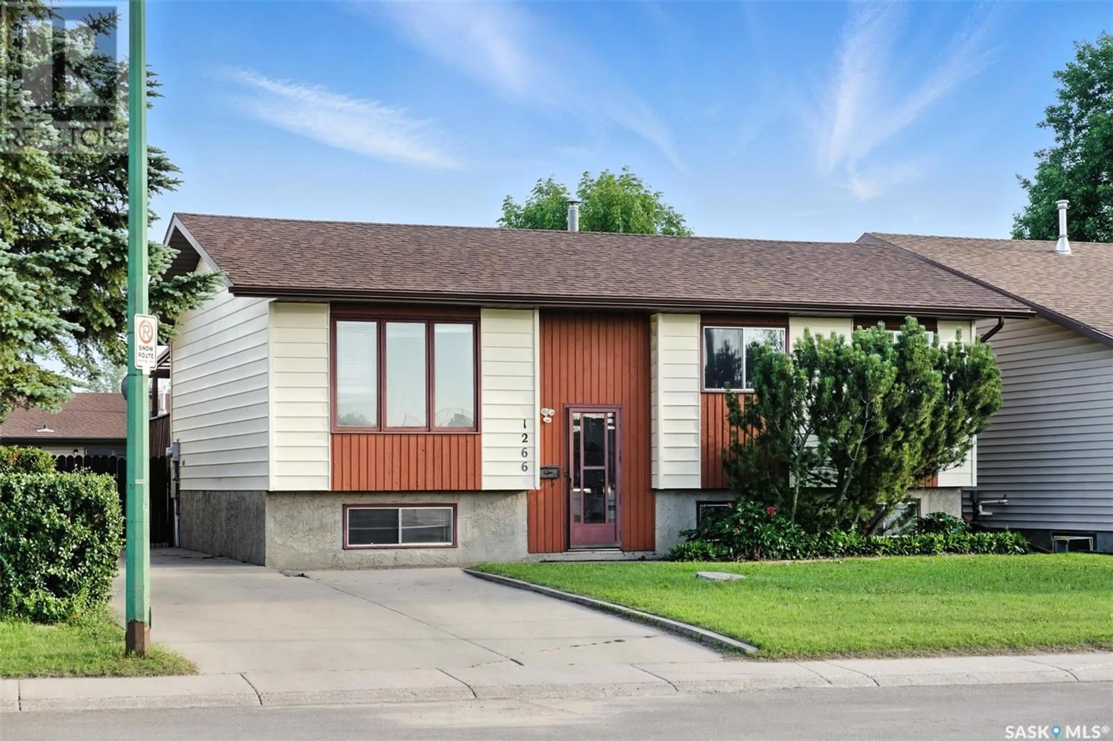 Home with vinyl exterior material, street for 1266 MCCORMACK ROAD, Saskatoon Saskatchewan S7M5L9