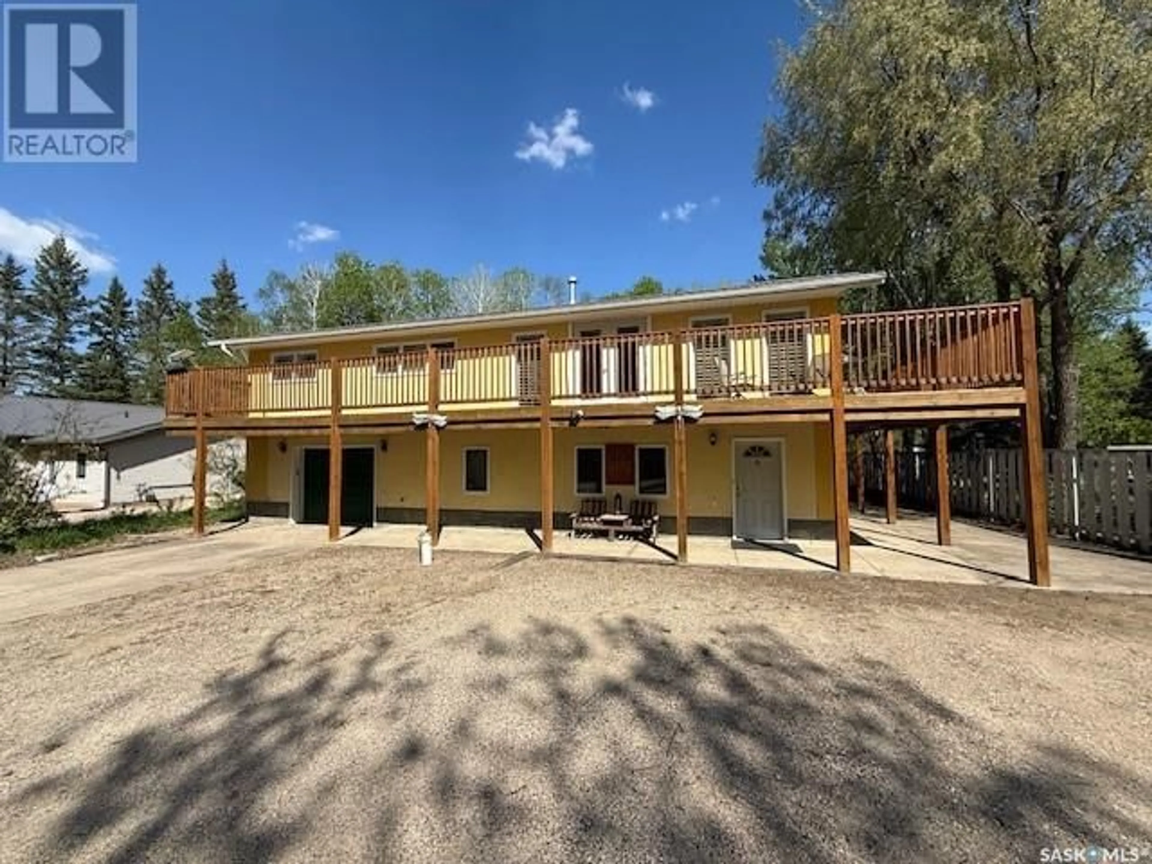 A pic from outside/outdoor area/front of a property/back of a property/a pic from drone, building for 814 SUNNY STREET, Kamsack Saskatchewan S0A1S0