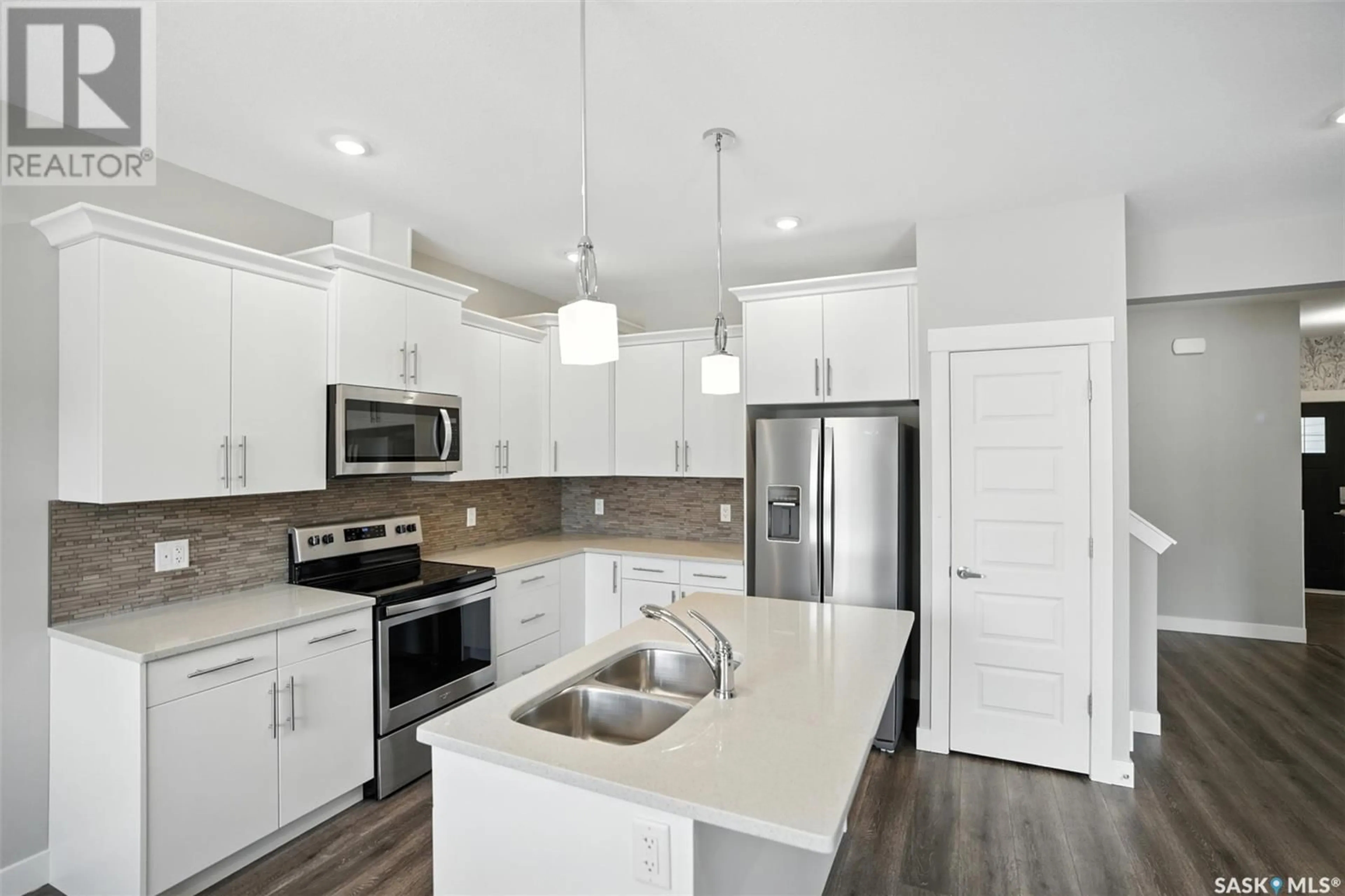 Open concept kitchen, unknown for 21 900 ST ANDREWS LANE, Warman Saskatchewan S0K4S4