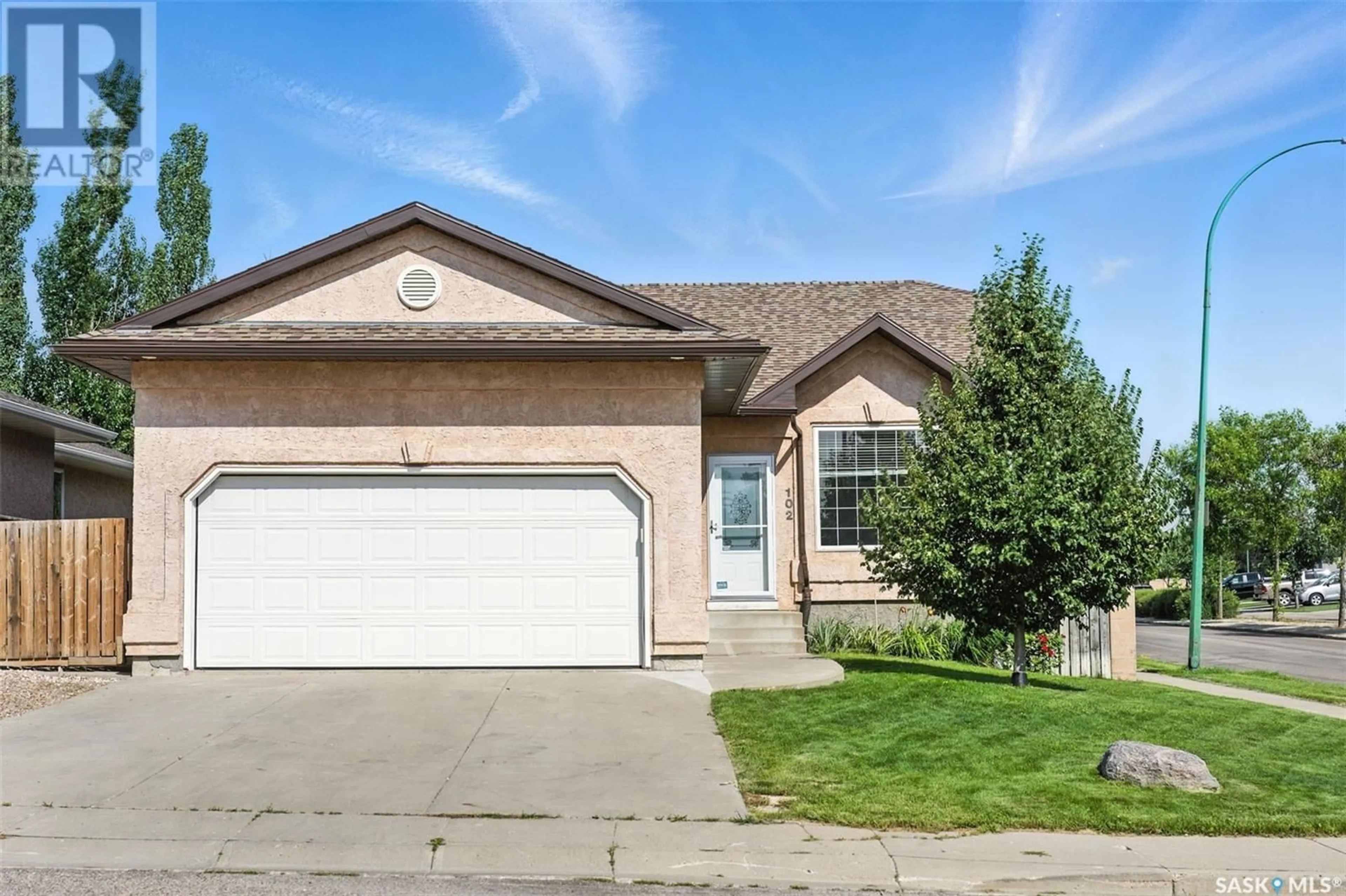 Home with vinyl exterior material, street for 102 BAYFIELD CRESCENT, Saskatoon Saskatchewan S7V1E3