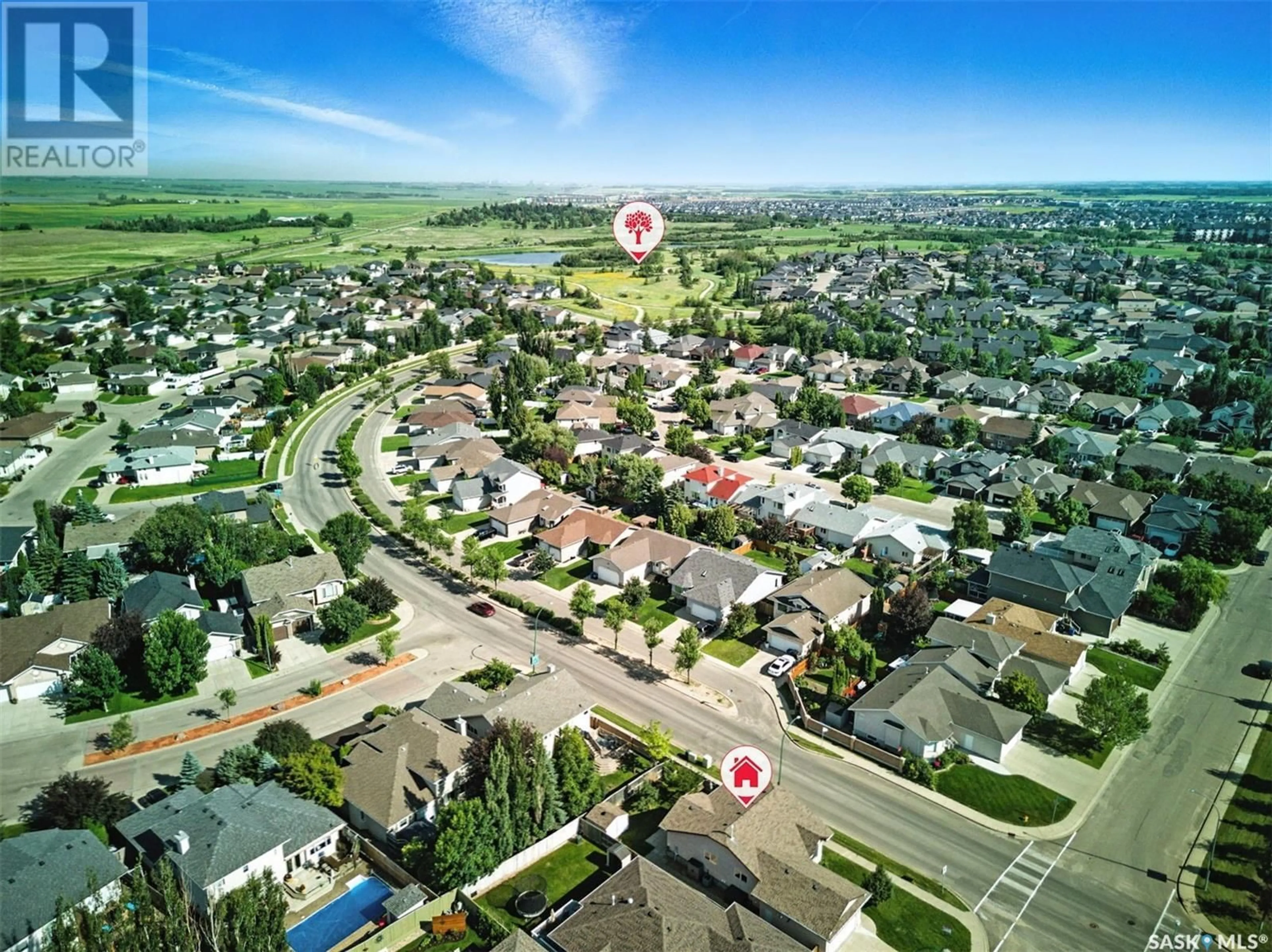 A pic from outside/outdoor area/front of a property/back of a property/a pic from drone, street for 102 BAYFIELD CRESCENT, Saskatoon Saskatchewan S7V1E3
