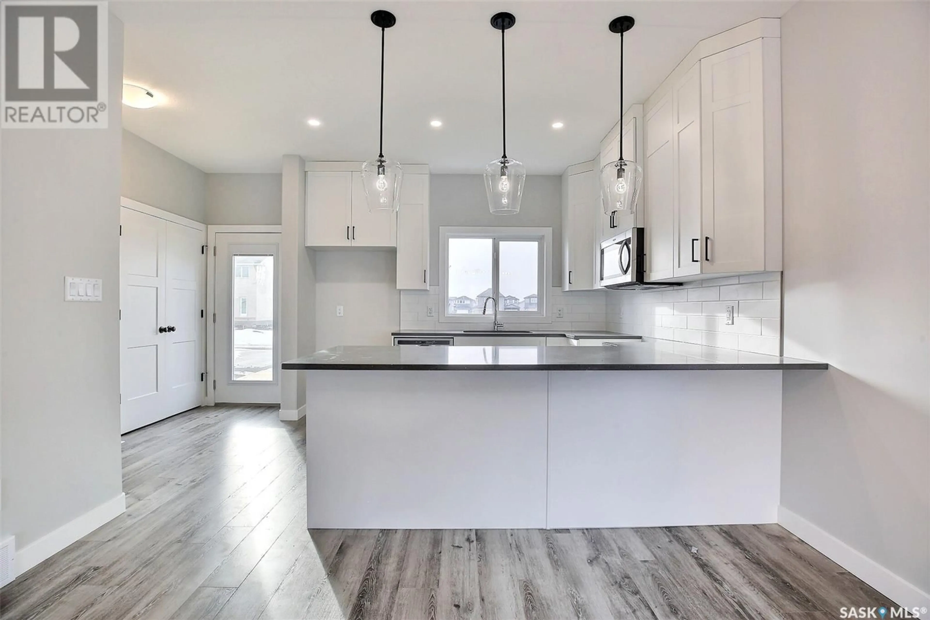 Open concept kitchen, unknown for 3140 GREEN TURTLE ROAD, Regina Saskatchewan S4N7K9