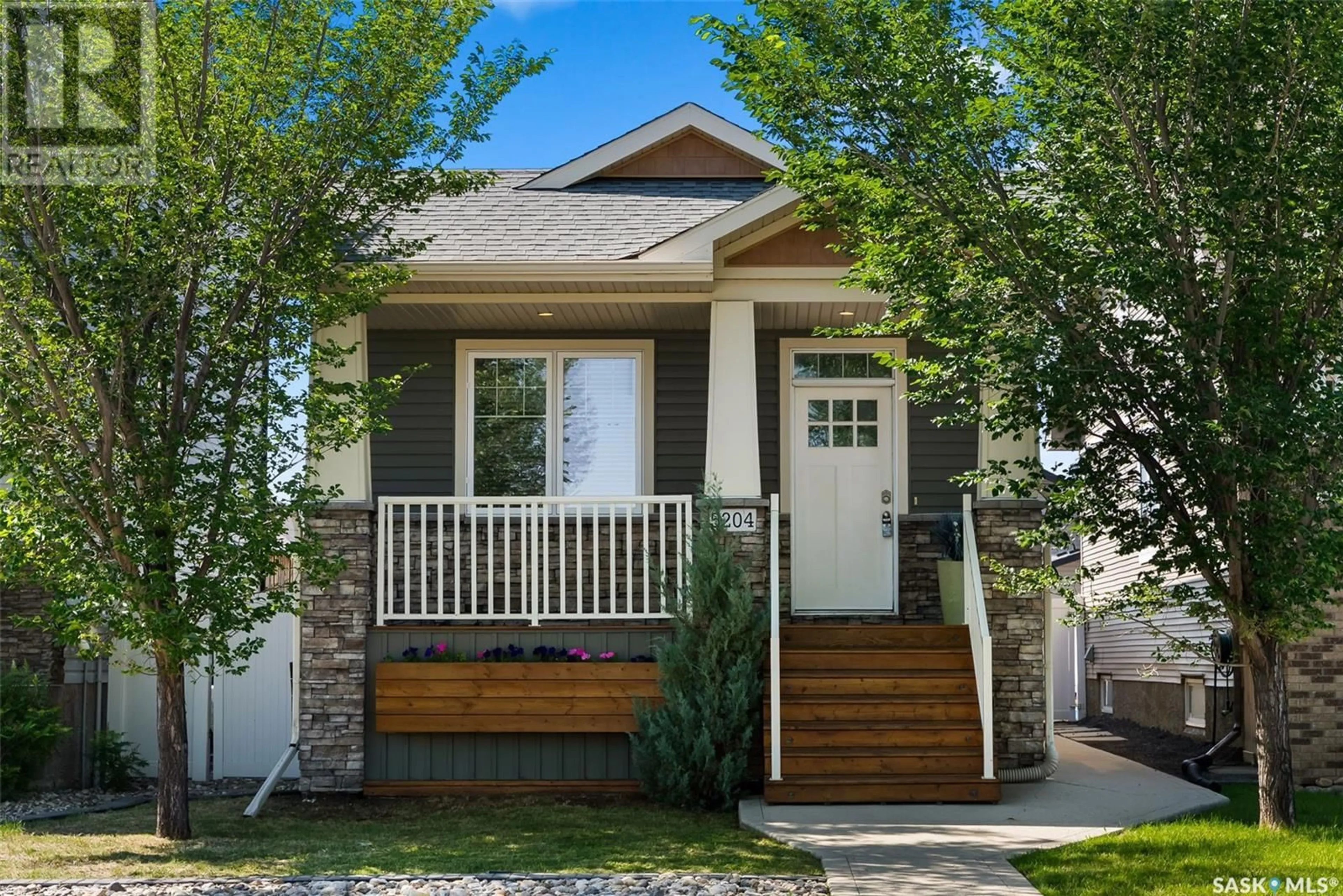 Home with vinyl exterior material, street for 5204 AERIAL CRESCENT, Regina Saskatchewan S4W0C8