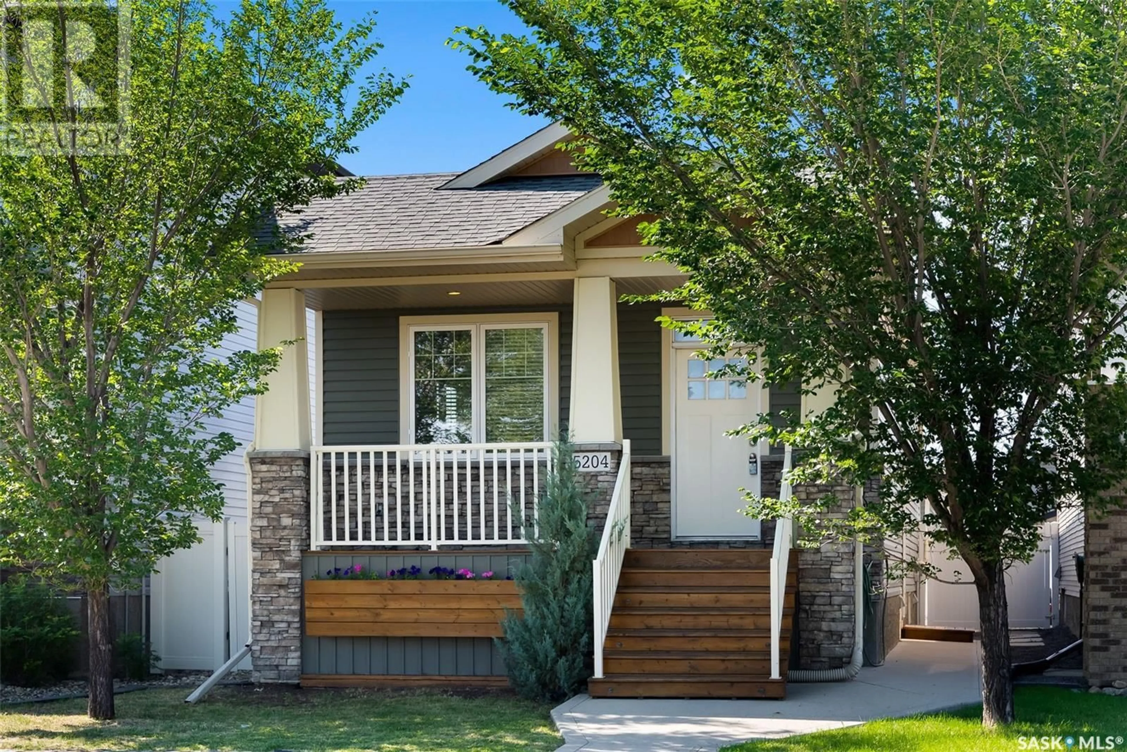Home with vinyl exterior material, street for 5204 AERIAL CRESCENT, Regina Saskatchewan S4W0C8