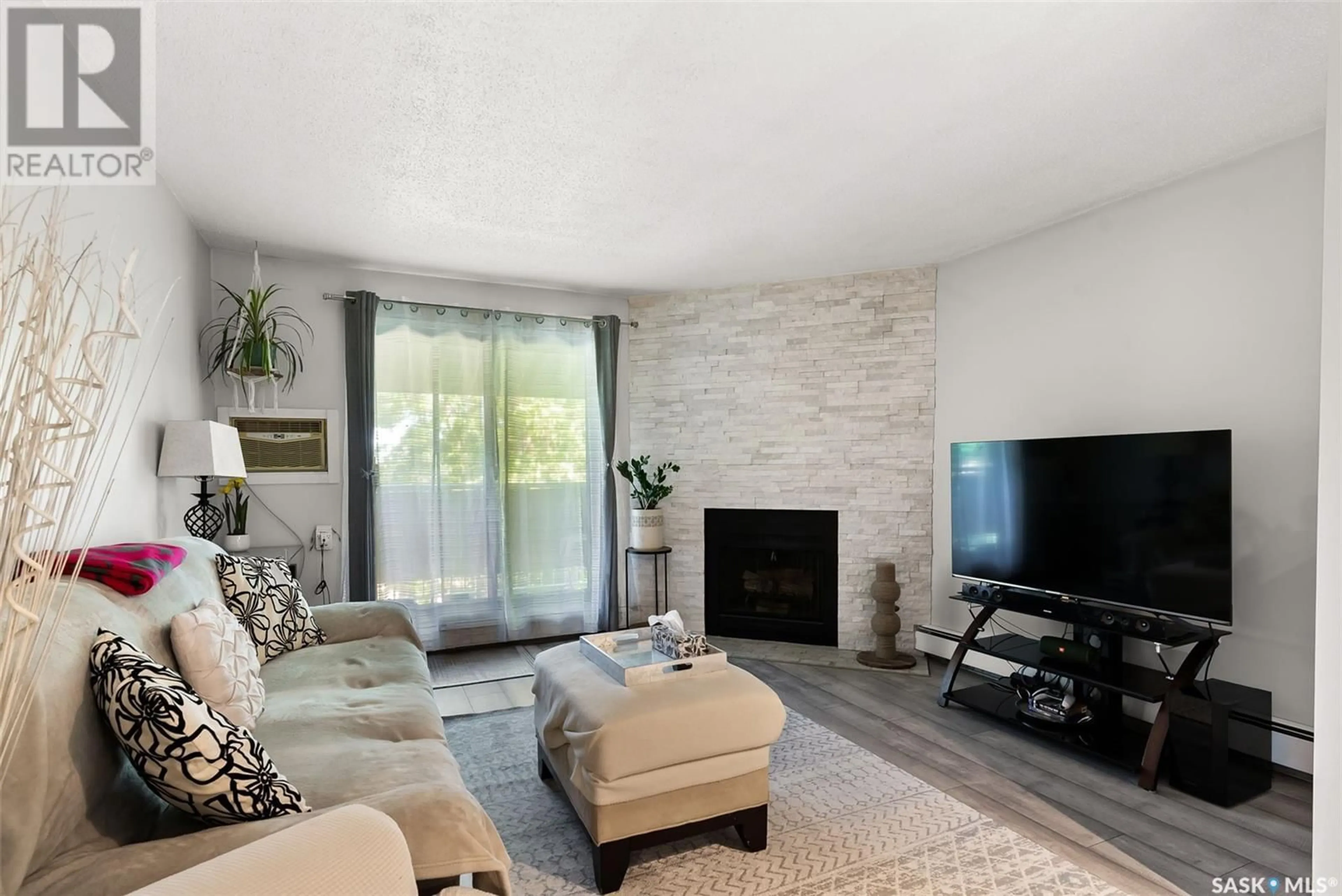 Living room with furniture, unknown for 2406 - 522 HESELTINE ROAD, Regina Saskatchewan S4V1N9