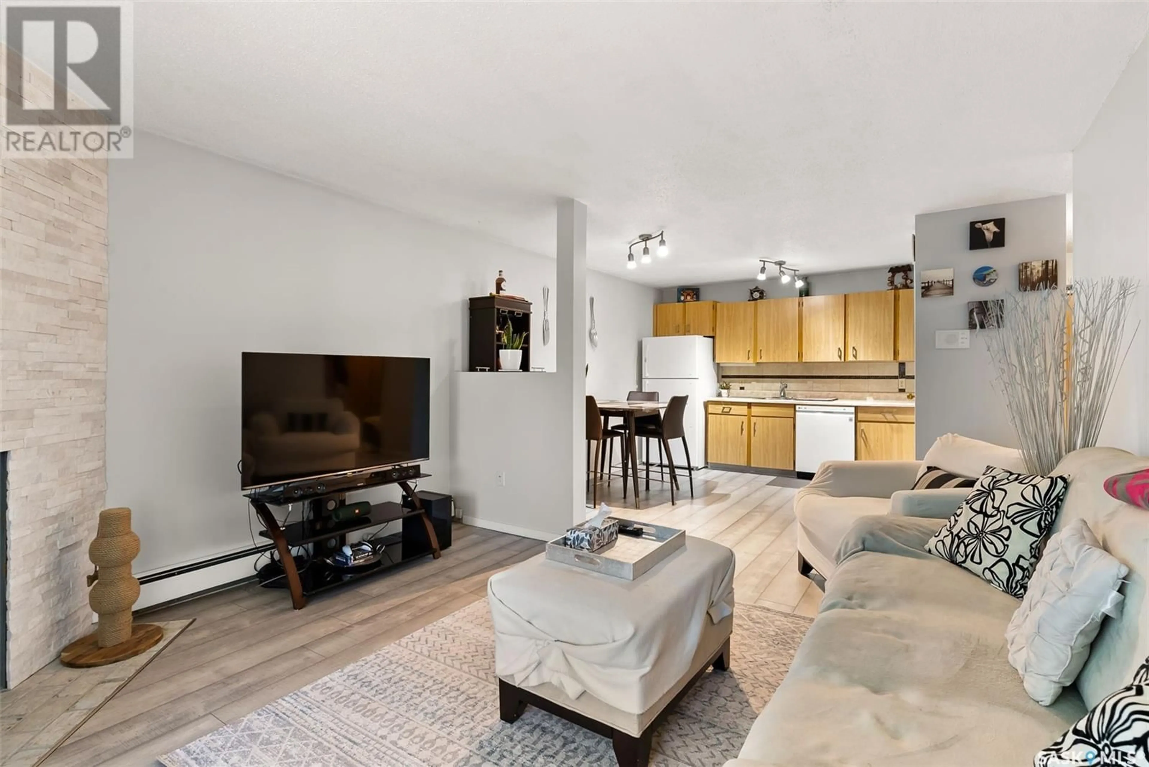 Living room with furniture, unknown for 2406 - 522 HESELTINE ROAD, Regina Saskatchewan S4V1N9