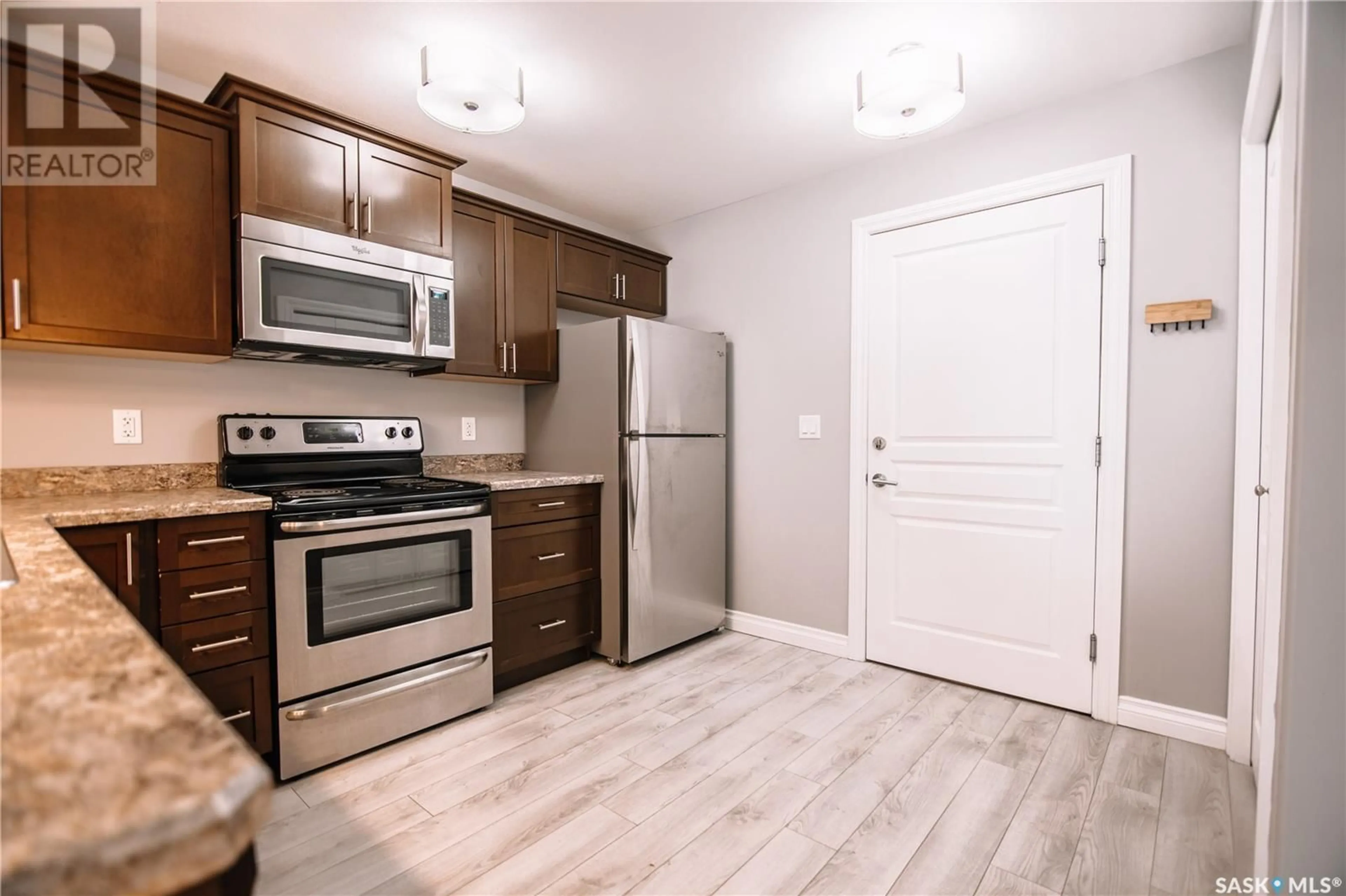 Standard kitchen, wood/laminate floor for #134 - 3630 HAUGHTON ROAD, Regina Saskatchewan S4V1P1