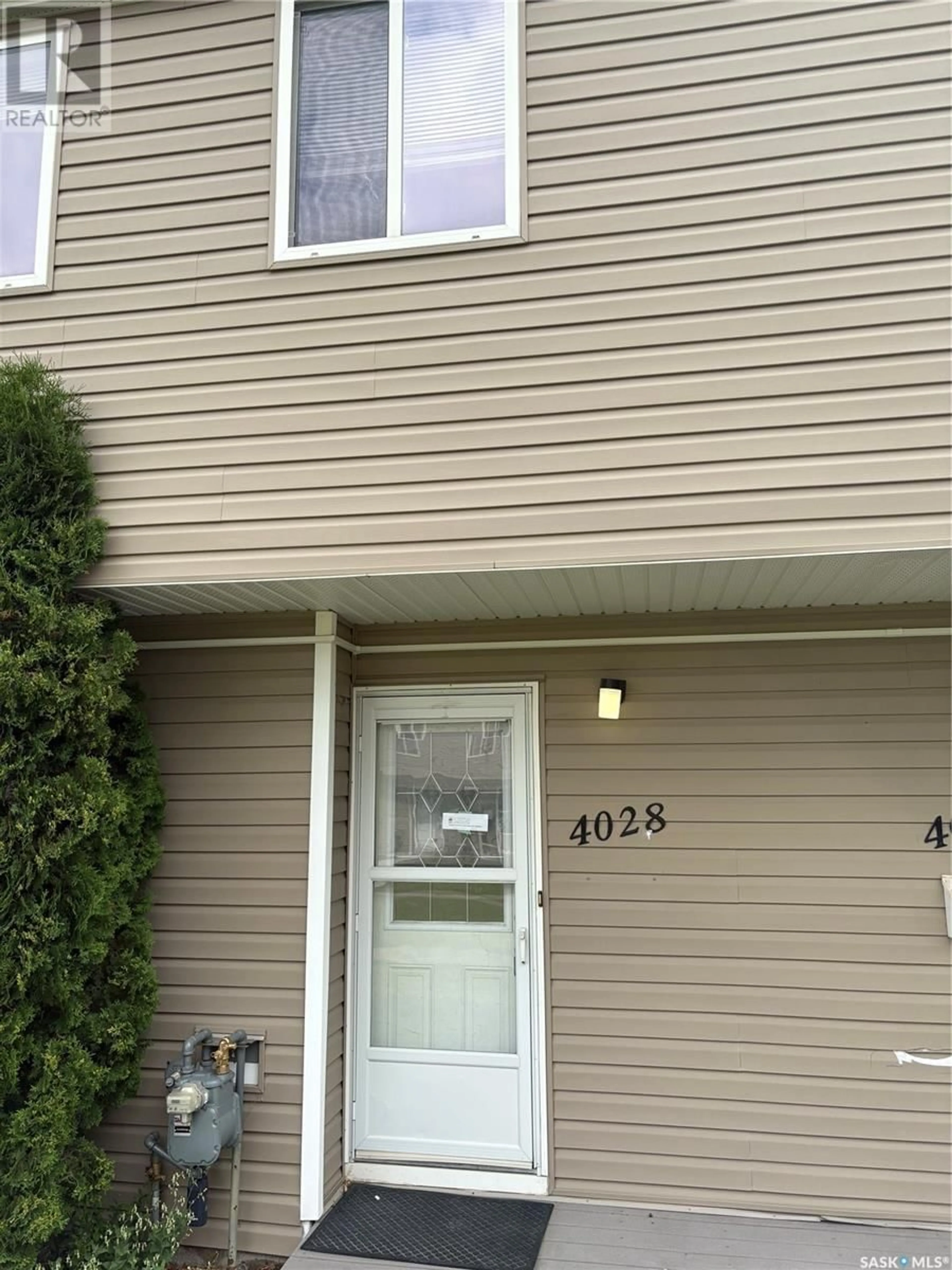 Home with vinyl exterior material, street for 4028 CASTLE ROAD, Regina Saskatchewan S4S6A4