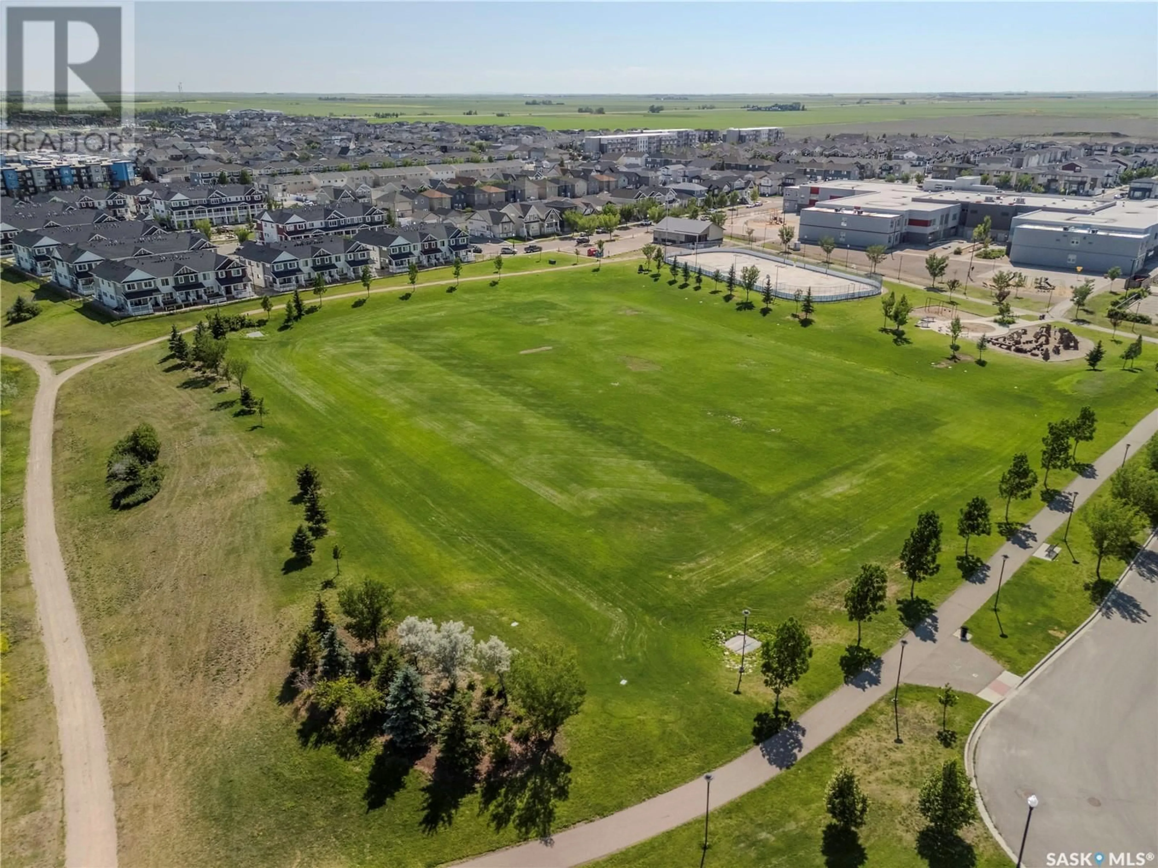 A pic from outside/outdoor area/front of a property/back of a property/a pic from drone, street for 23 5286 AERODROME ROAD, Regina Saskatchewan S4W0P4
