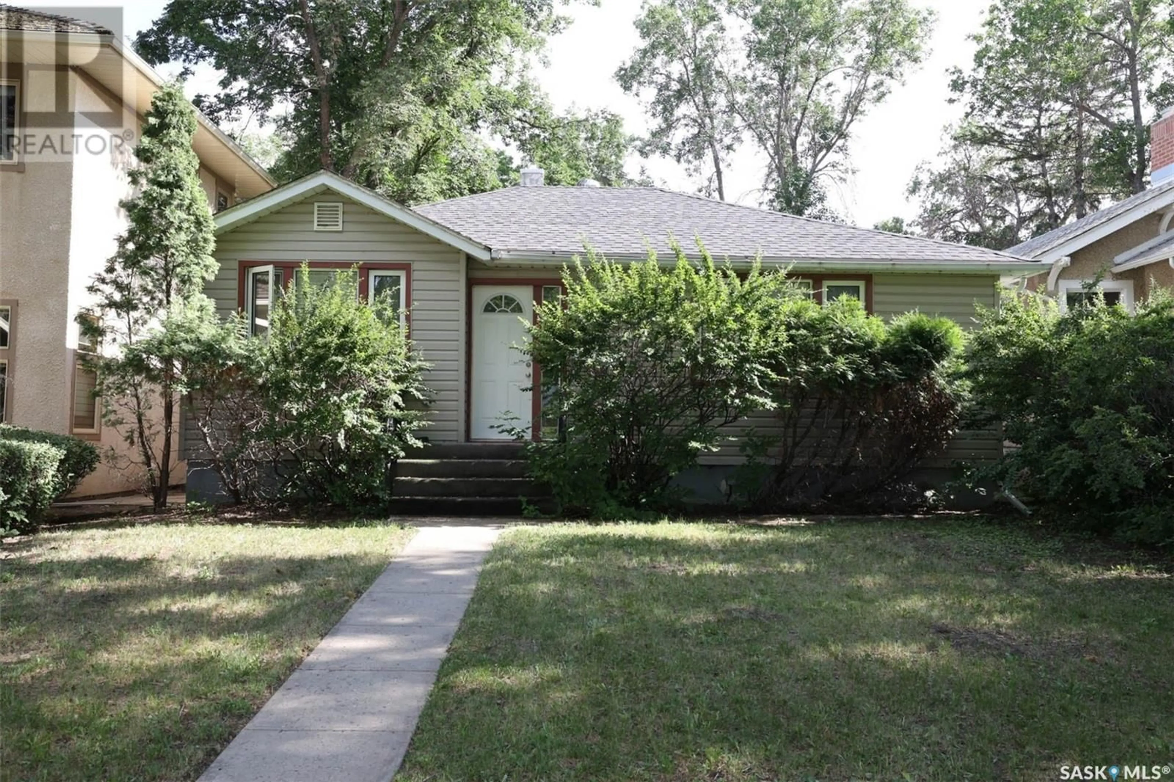 Home with vinyl exterior material, street for 2711 HILL AVENUE, Regina Saskatchewan S4S0V5