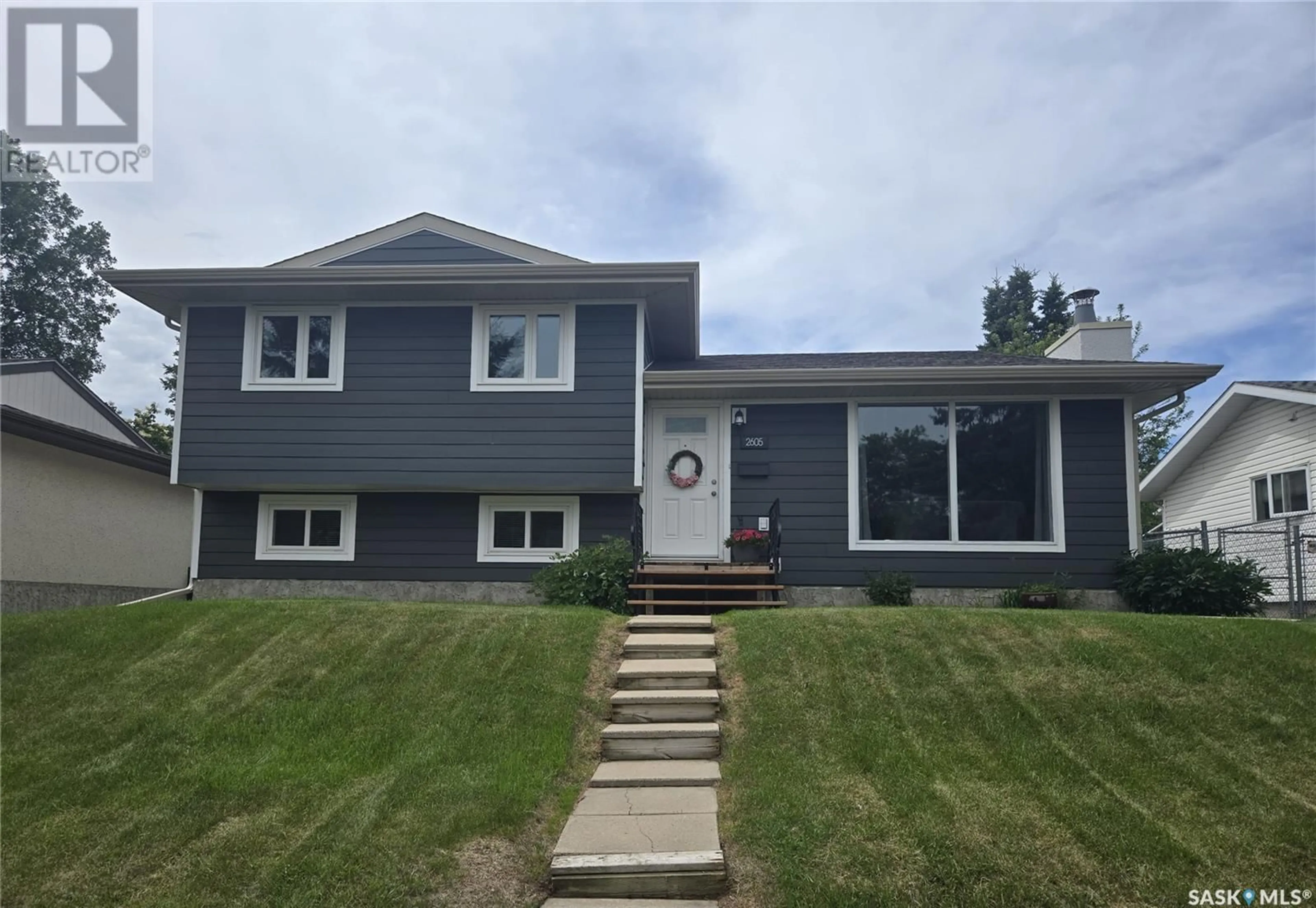 Home with vinyl exterior material, street for 2605 15TH AVENUE, Prince Albert Saskatchewan S6V6H4