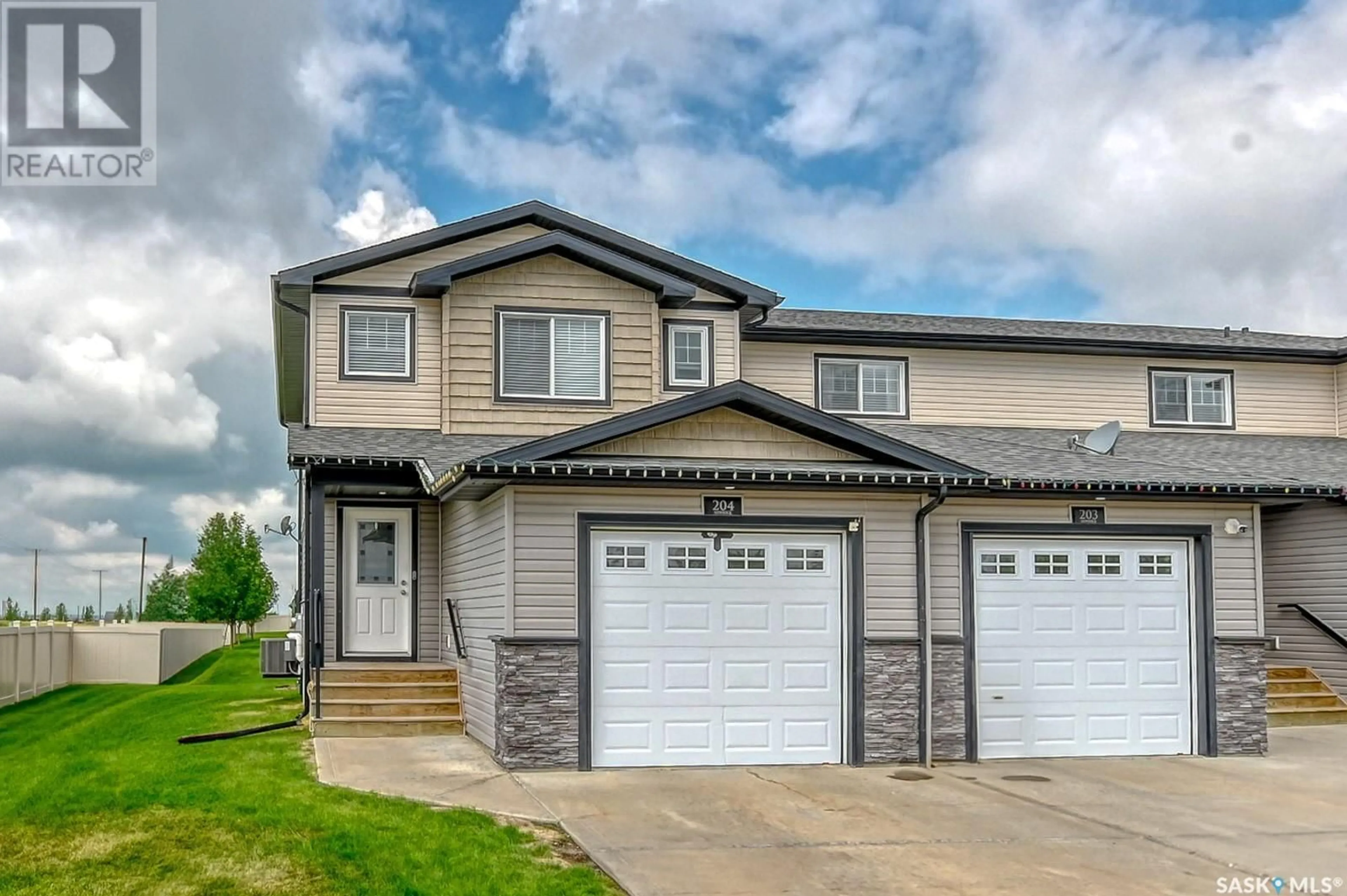 Home with vinyl exterior material, street for 204 2 SAVANNA CRESCENT, Pilot Butte Saskatchewan S0G3Z0