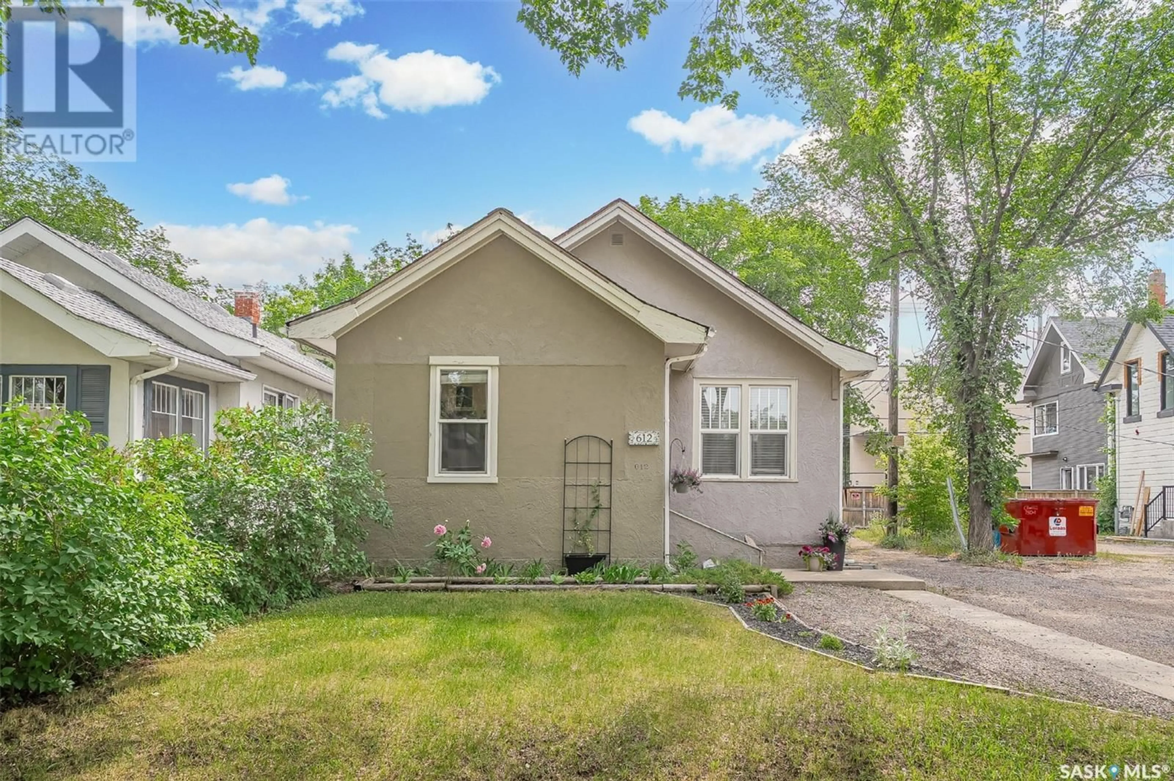 Home with vinyl exterior material, street for 612 5TH AVENUE, Saskatoon Saskatchewan S7K2R4
