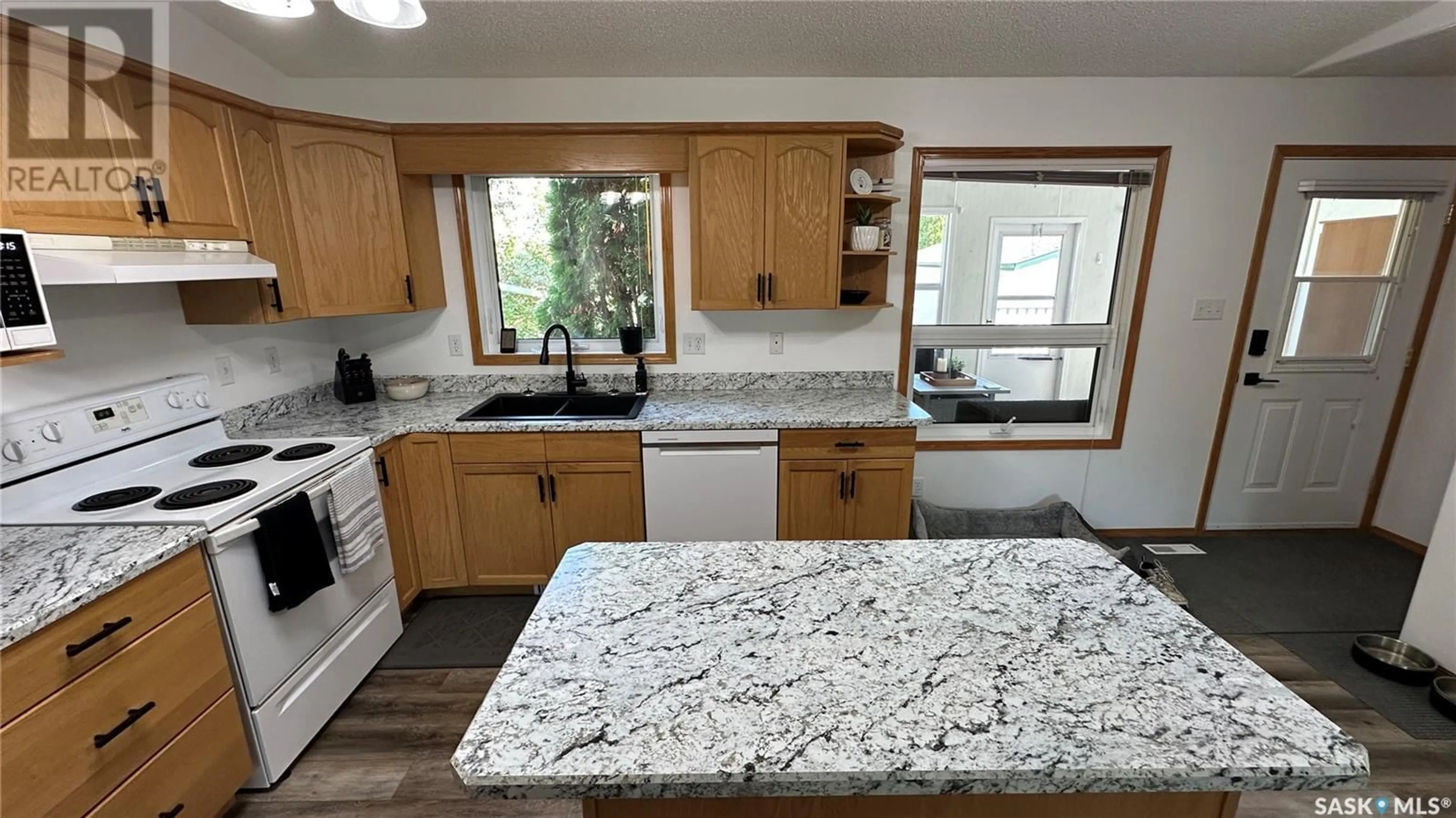 Standard kitchen, ceramic/tile floor for 903 104TH AVENUE, Tisdale Saskatchewan S0E1T0