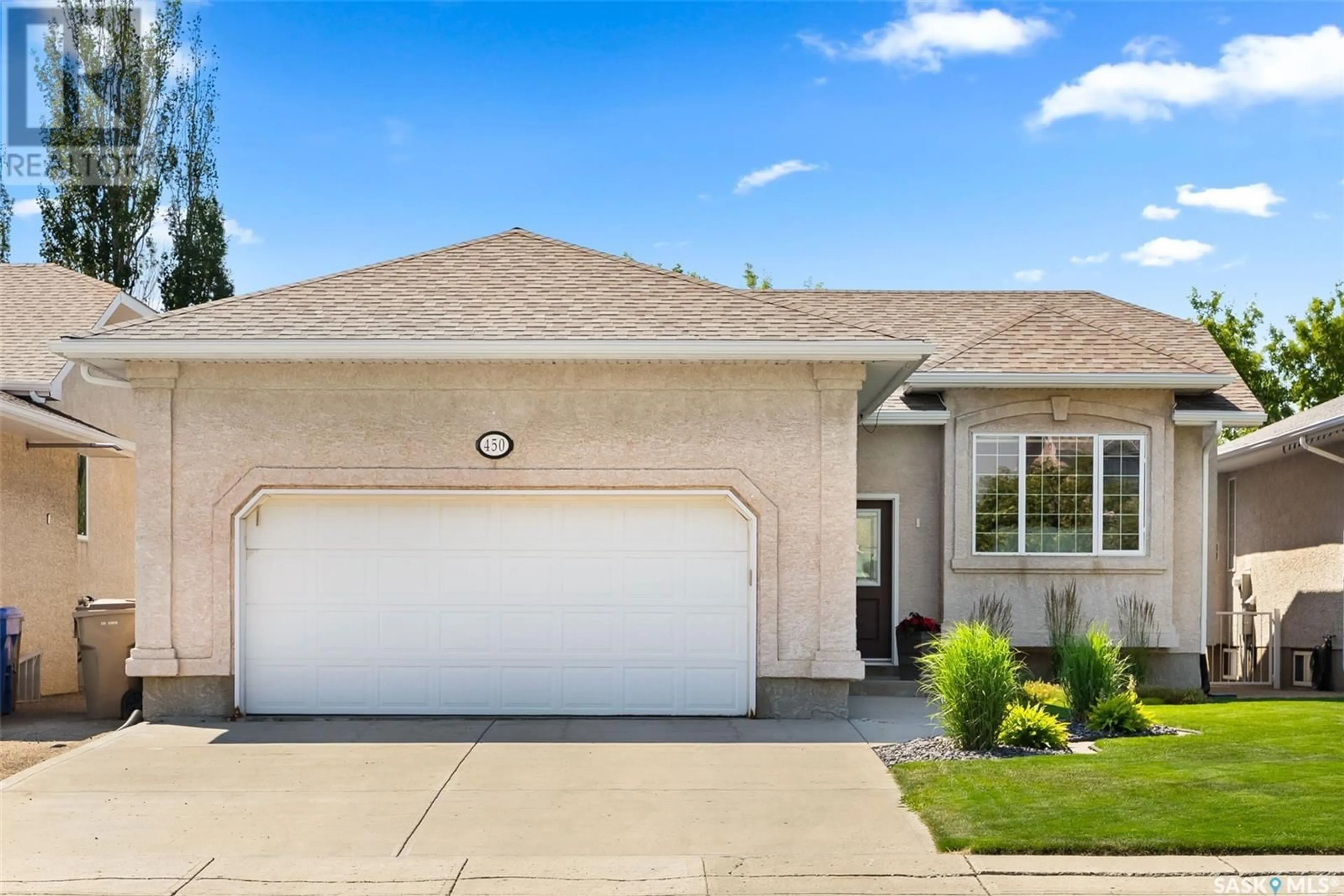 Home with vinyl exterior material, street for 450 FAIRWAY ROAD, Regina Saskatchewan S4Y1A2
