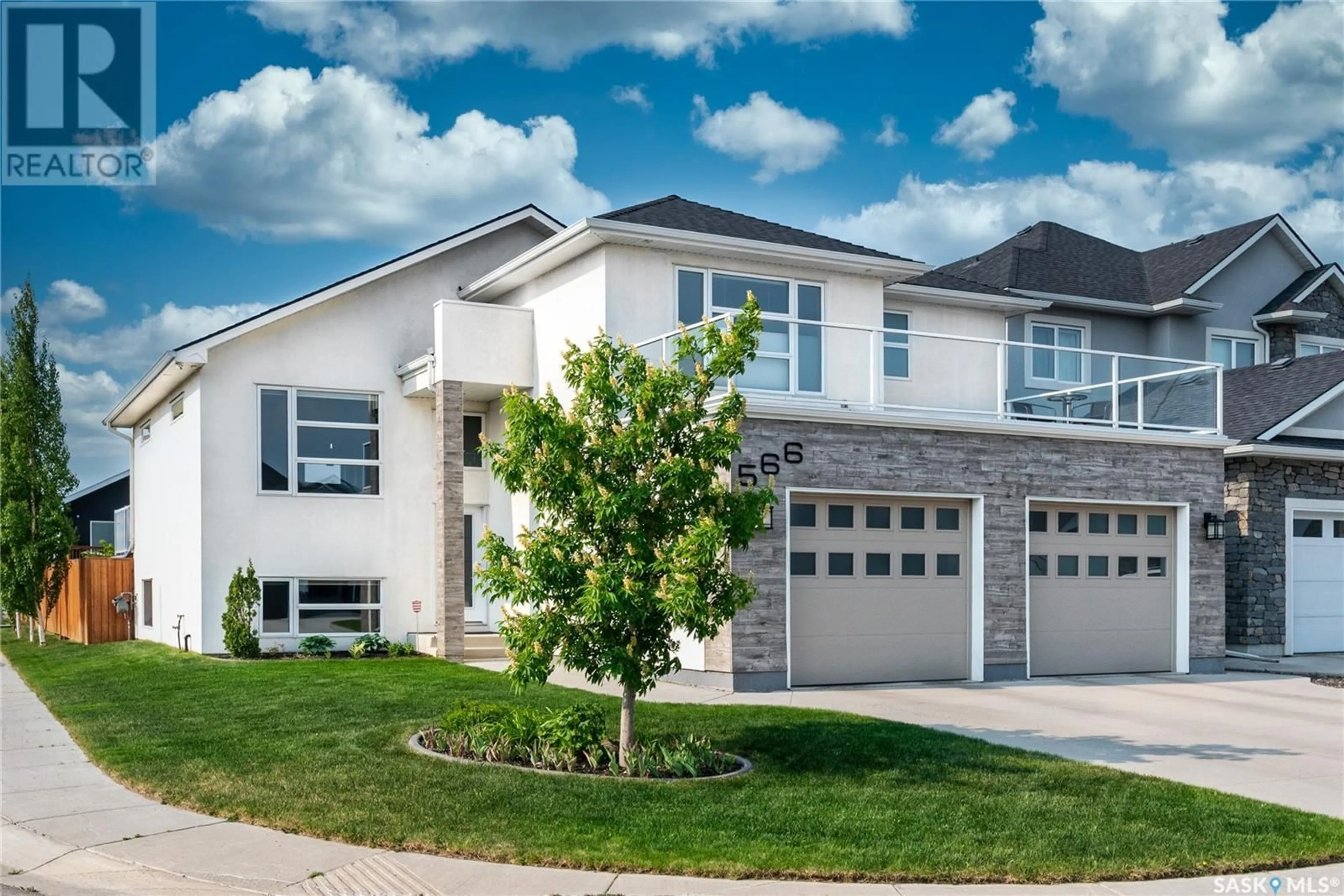 Home with vinyl exterior material, street for 566 BOYKOWICH CRESCENT, Saskatoon Saskatchewan S7W0S5