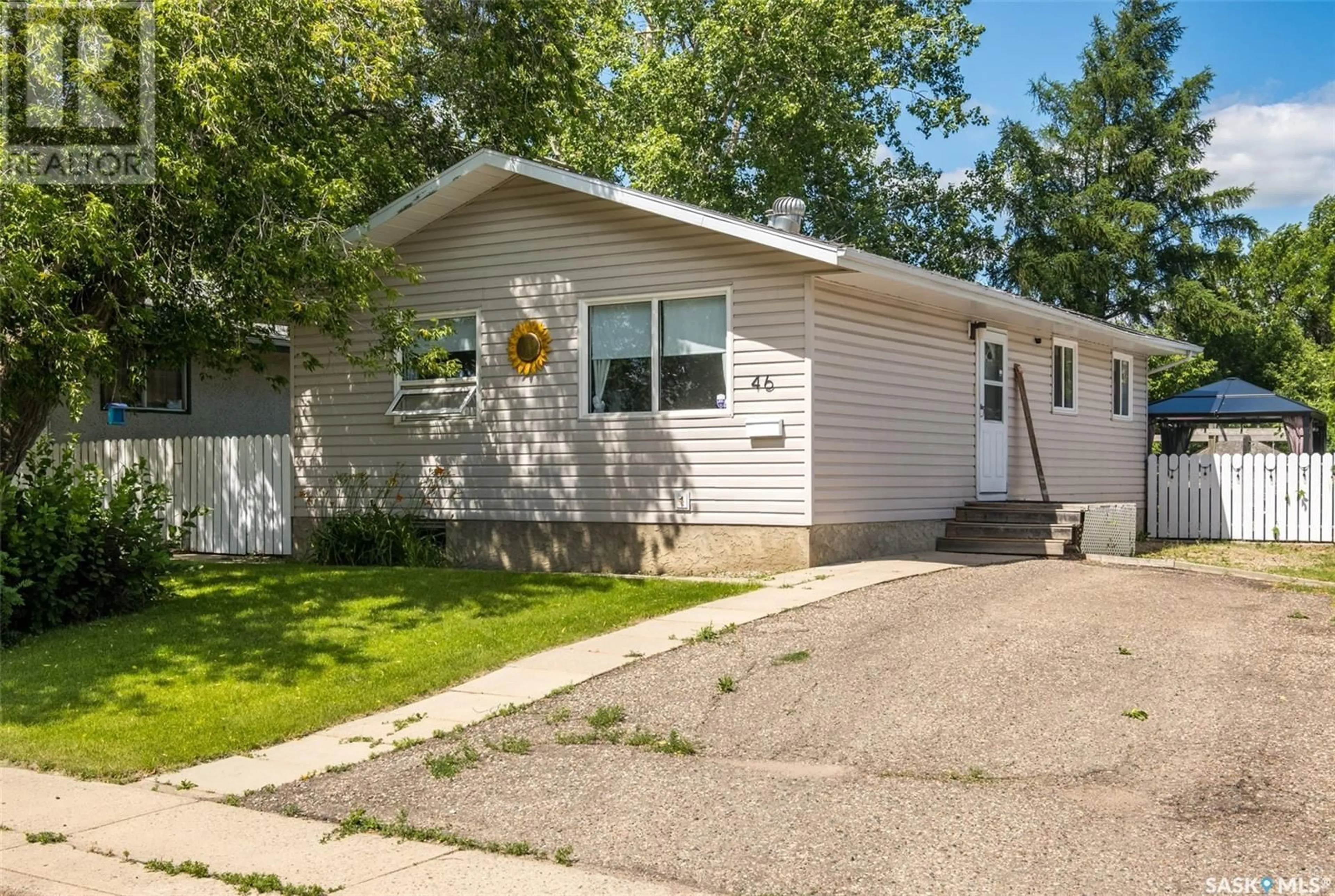 Home with vinyl exterior material, street for 46 BEREZOWSKY DRIVE, Prince Albert Saskatchewan S6V6M5