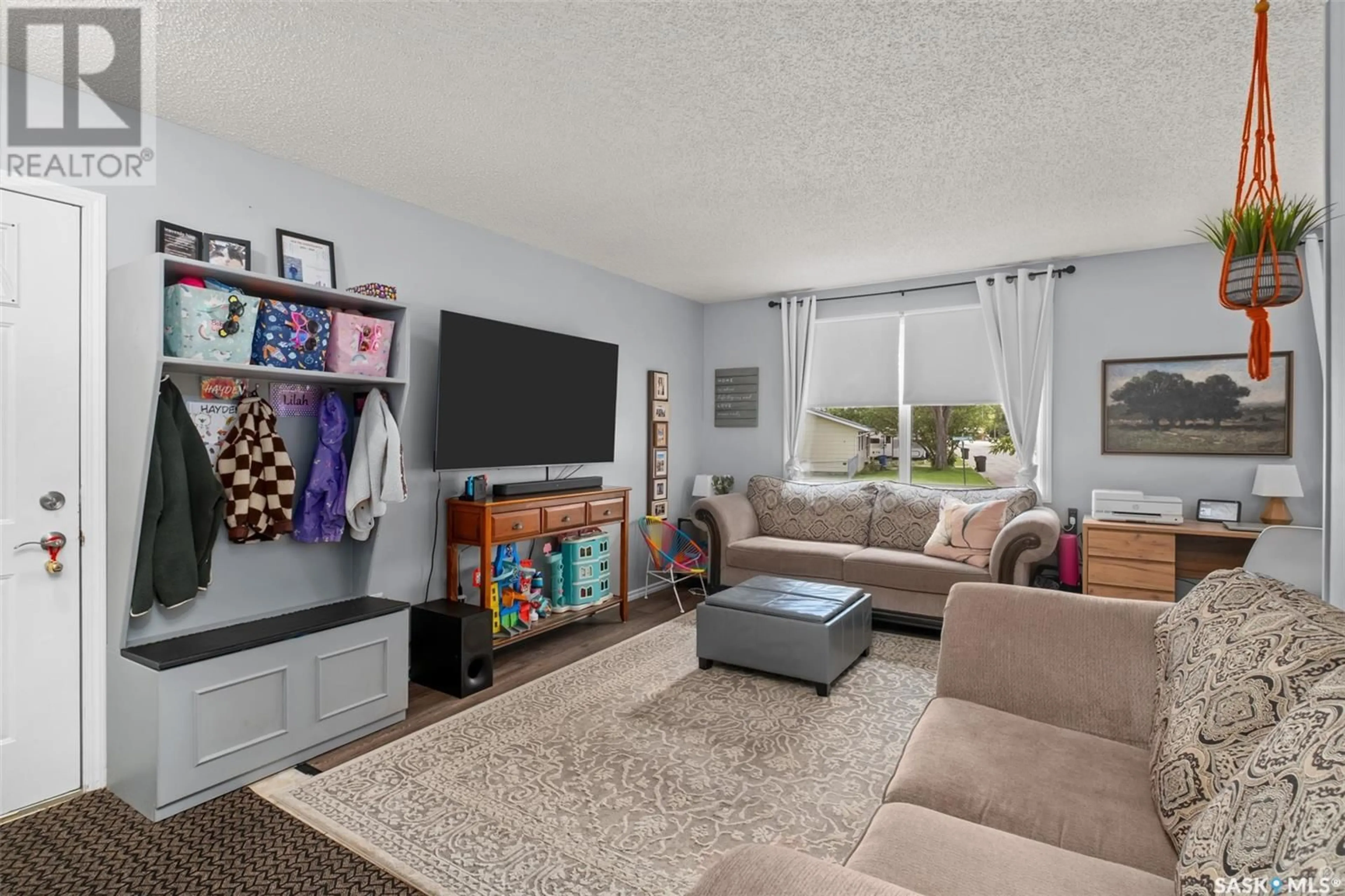 Living room with furniture, unknown for 46 BEREZOWSKY DRIVE, Prince Albert Saskatchewan S6V6M5
