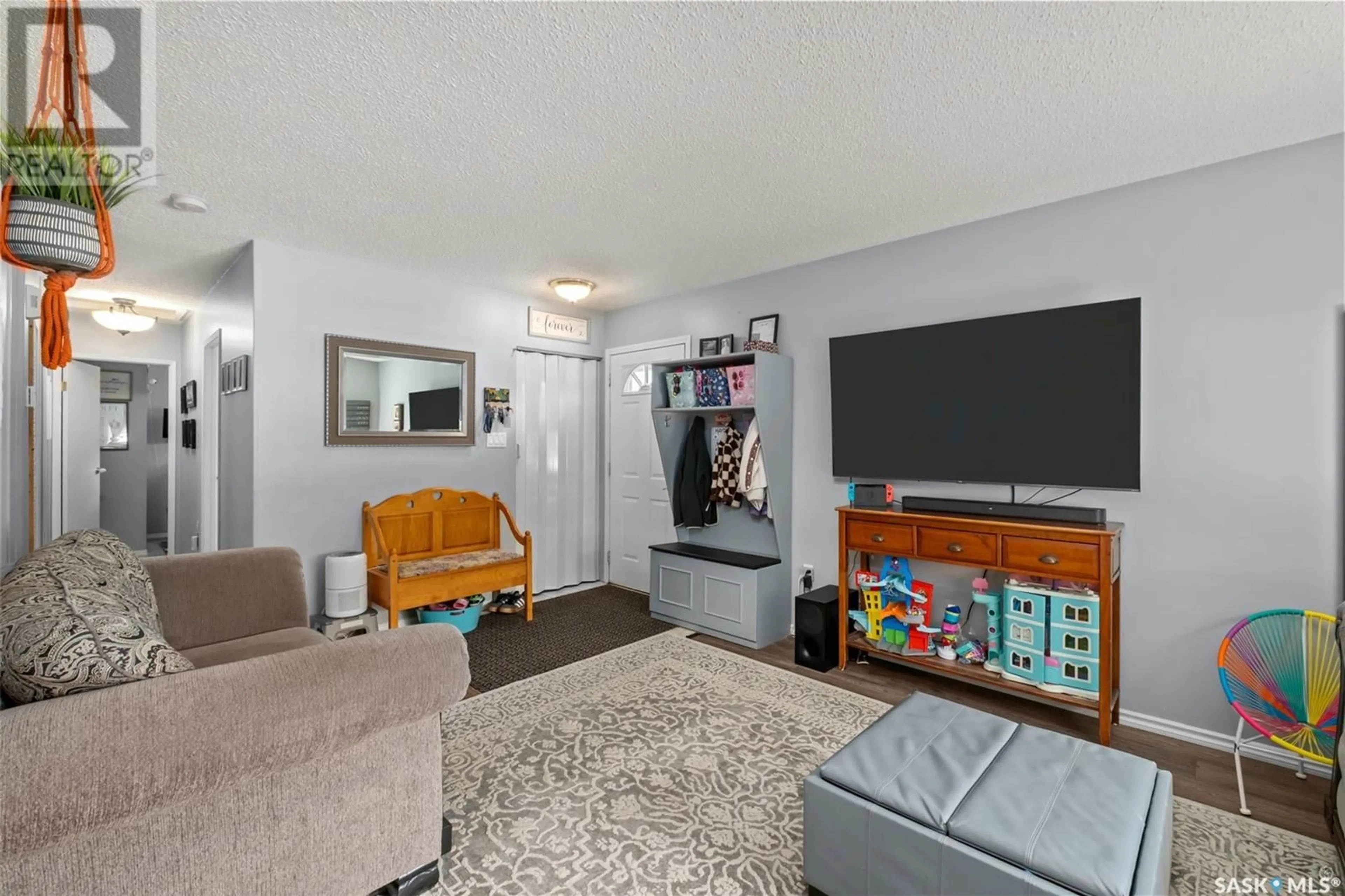 Living room with furniture, unknown for 46 BEREZOWSKY DRIVE, Prince Albert Saskatchewan S6V6M5