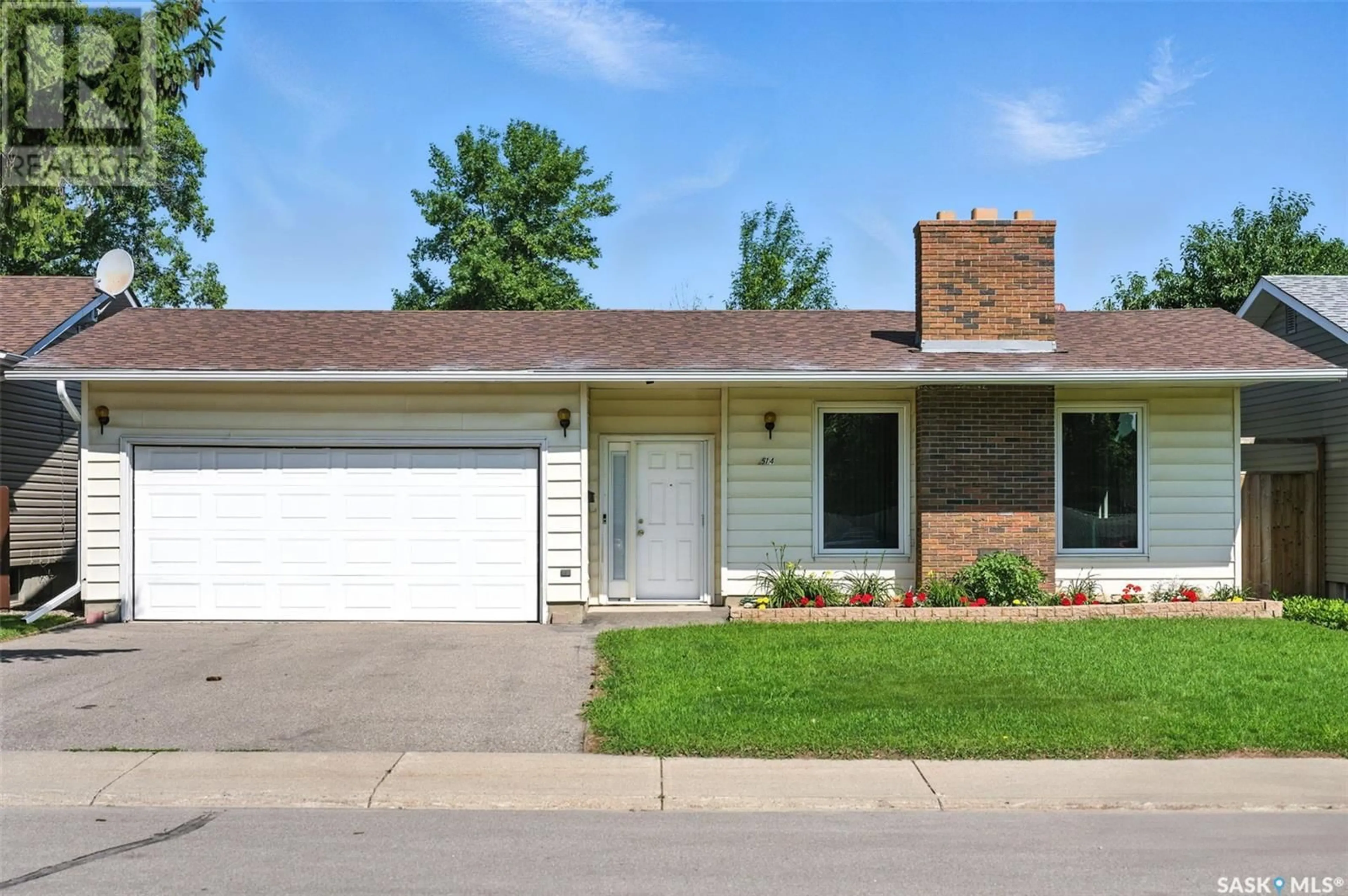 Home with brick exterior material, street for 514 FORRESTER ROAD, Saskatoon Saskatchewan S7M4G6