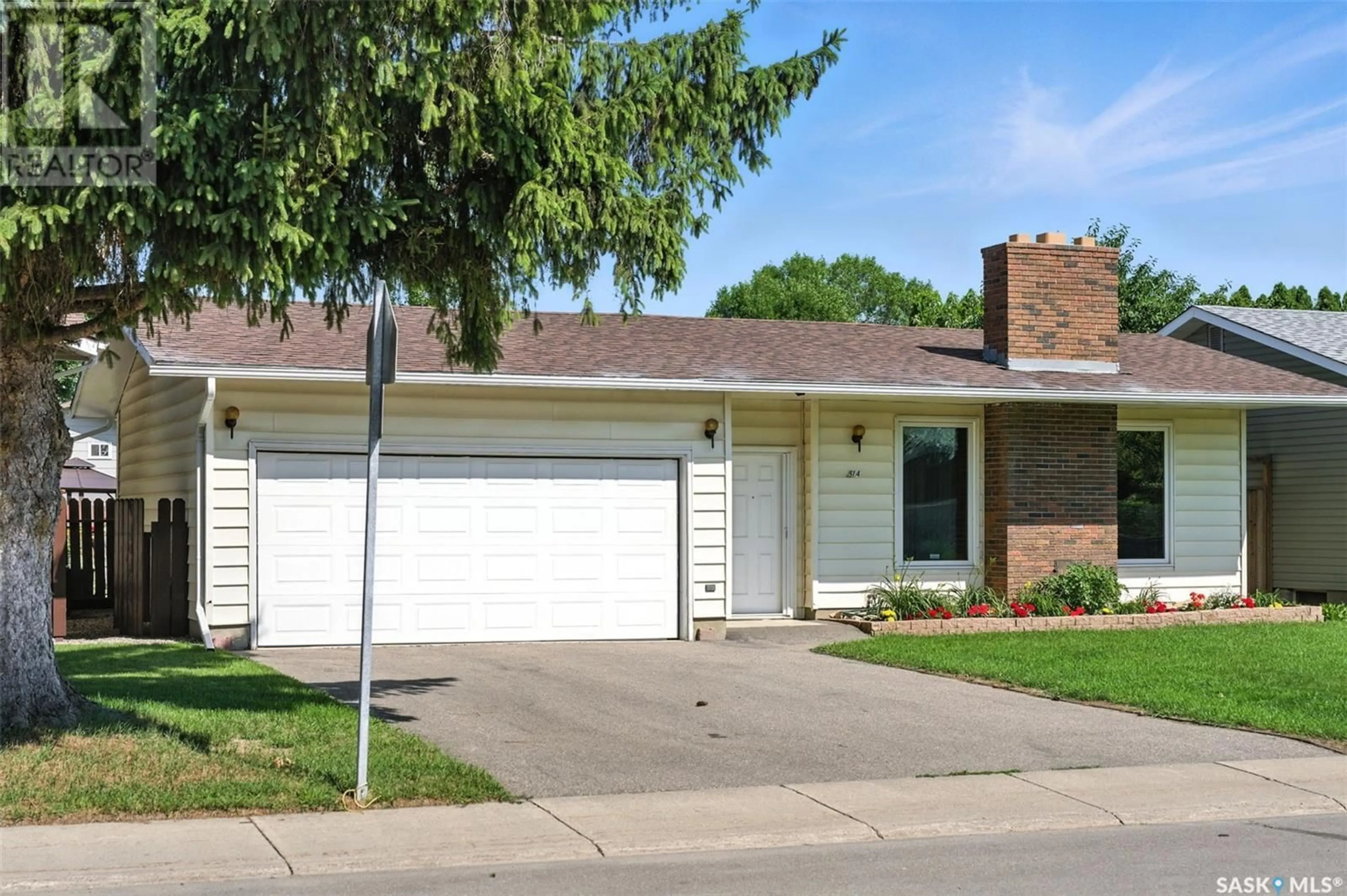 Home with brick exterior material, street for 514 FORRESTER ROAD, Saskatoon Saskatchewan S7M4G6