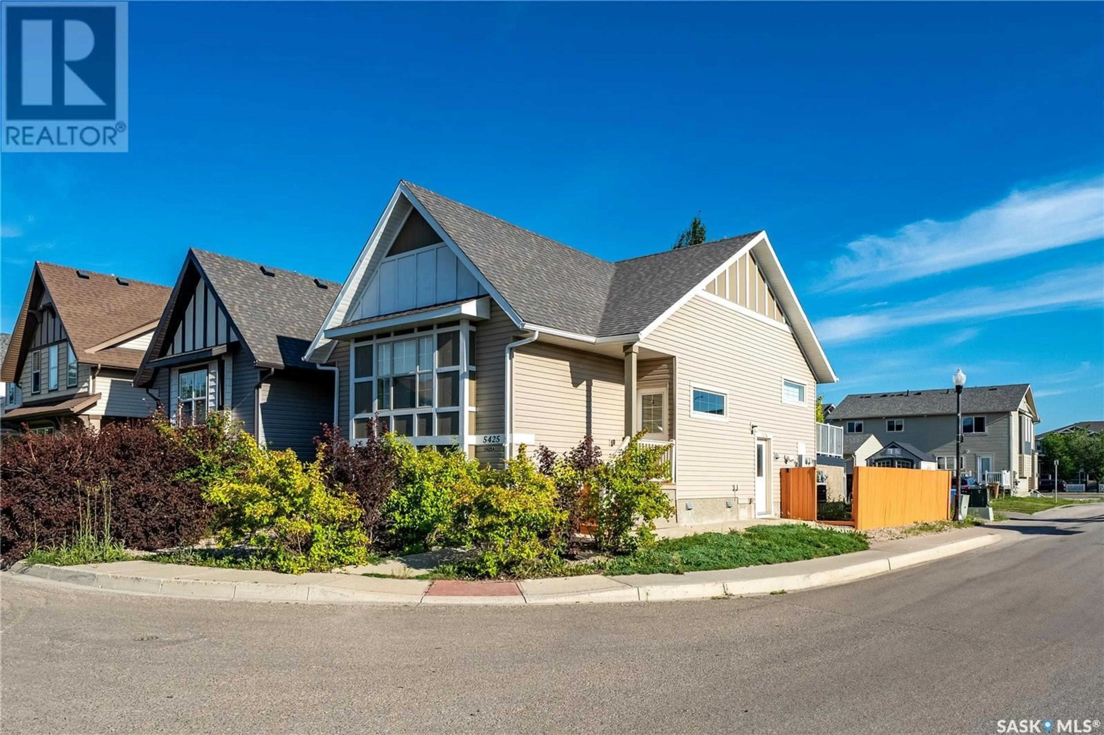Home with vinyl exterior material, street for 5425 WHEREATT ROAD, Regina Saskatchewan S4W0K3