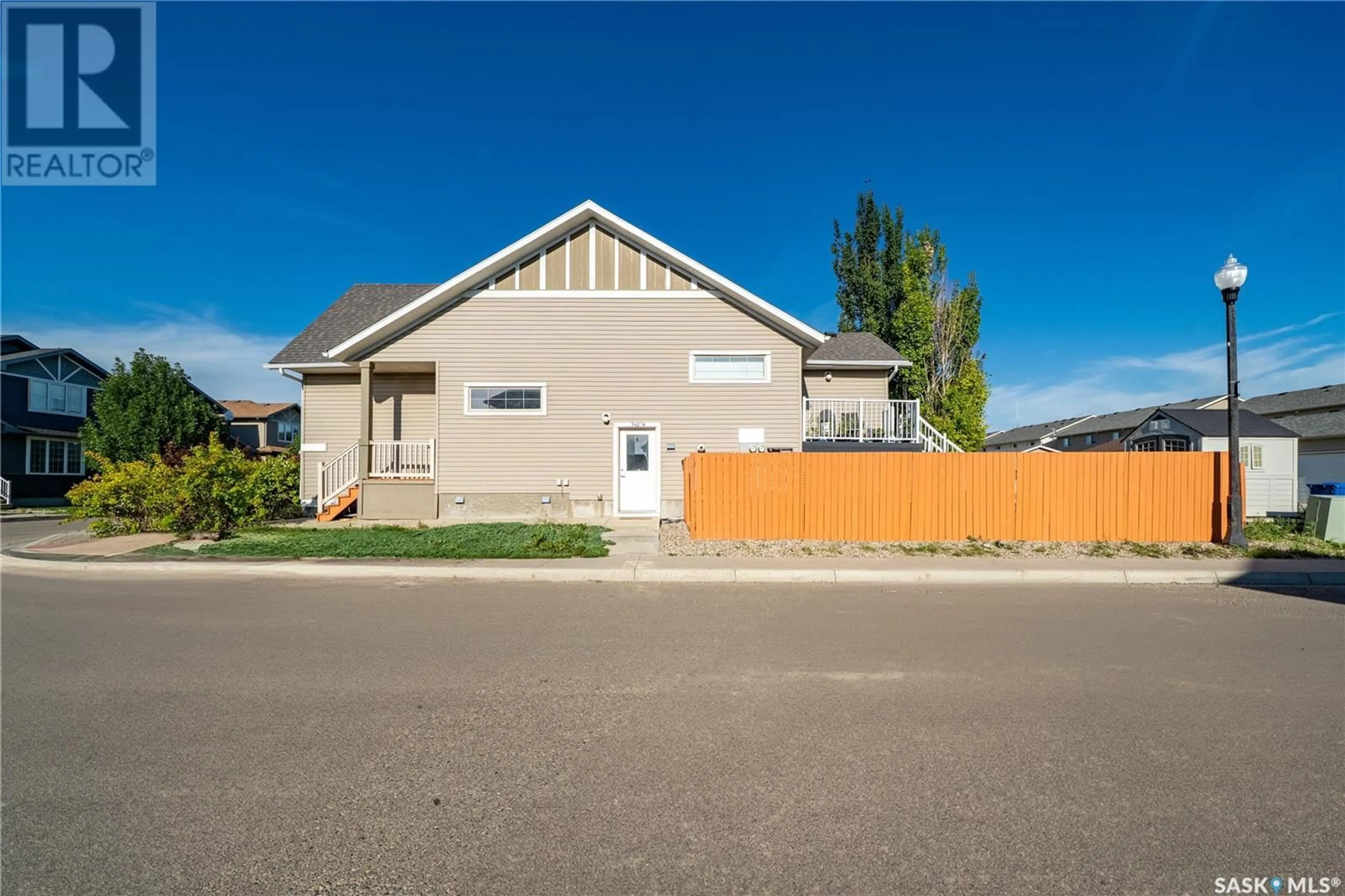 Home with vinyl exterior material, street for 5425 WHEREATT ROAD, Regina Saskatchewan S4W0K3