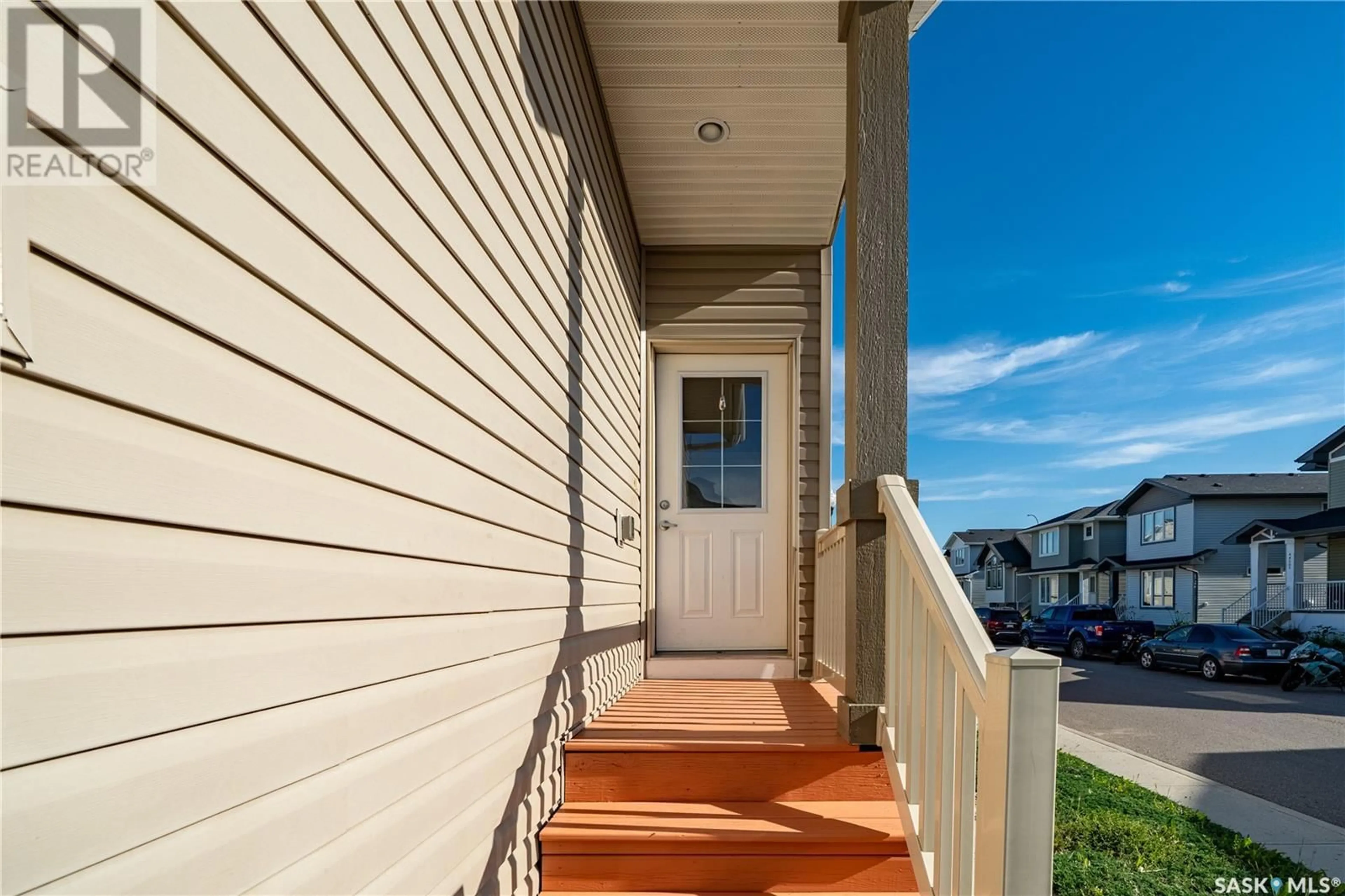 Home with vinyl exterior material, street for 5425 WHEREATT ROAD, Regina Saskatchewan S4W0K3