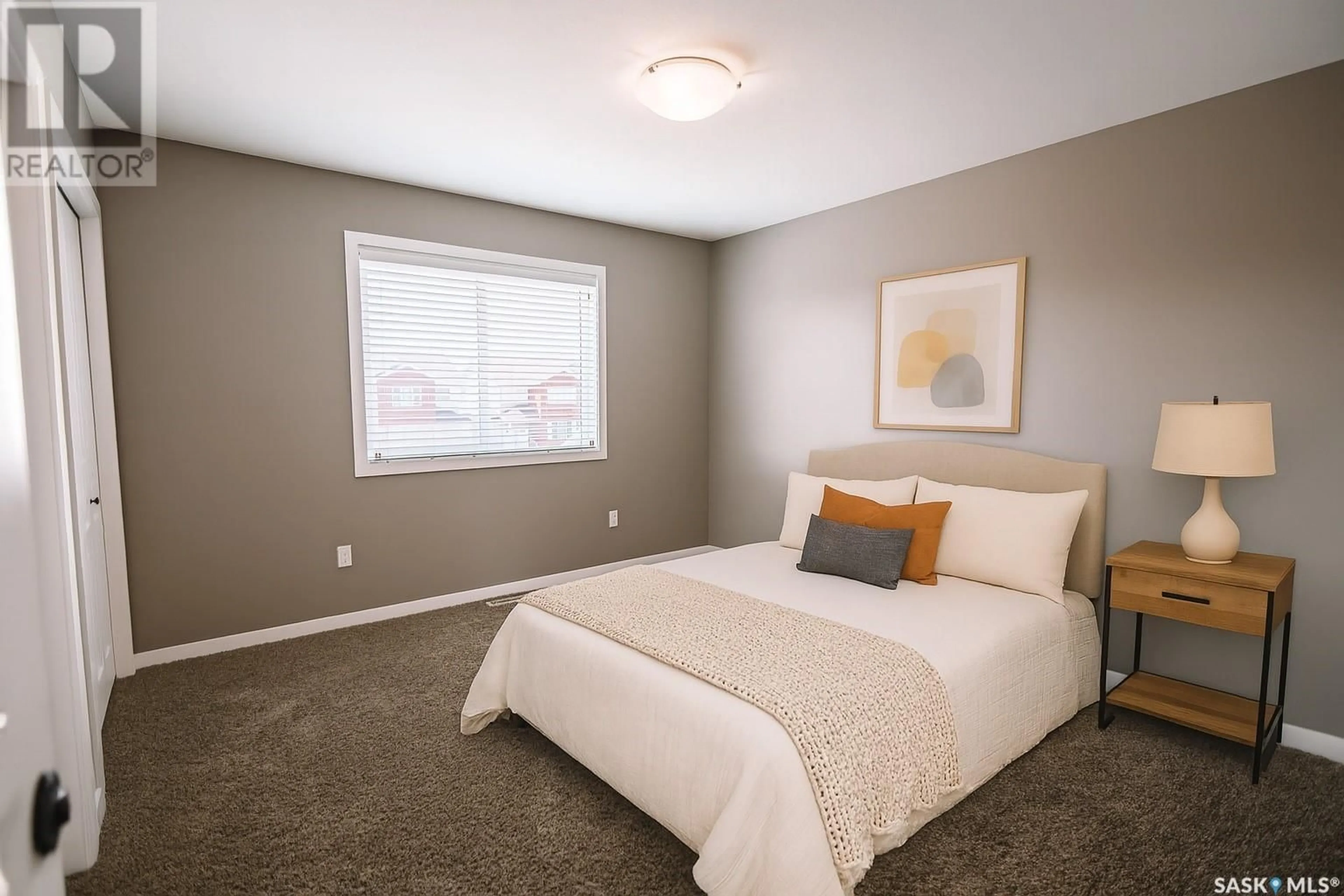 Bedroom with bed, carpet floor for 25 5004 JAMES HILL ROAD, Regina Saskatchewan S4W0E8