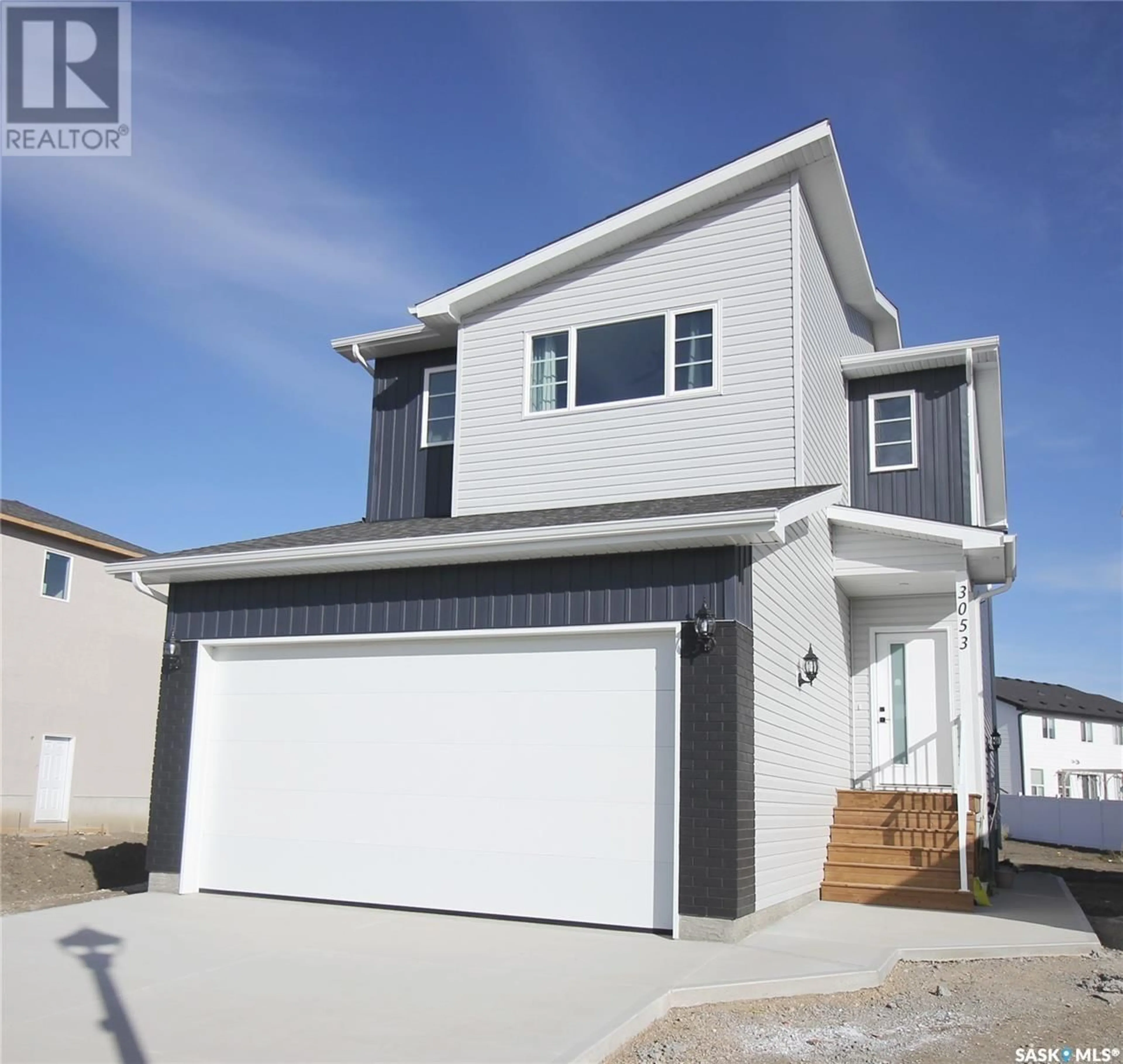 Home with vinyl exterior material, street for 3005 DUMONT WAY, Regina Saskatchewan S4V3Z3