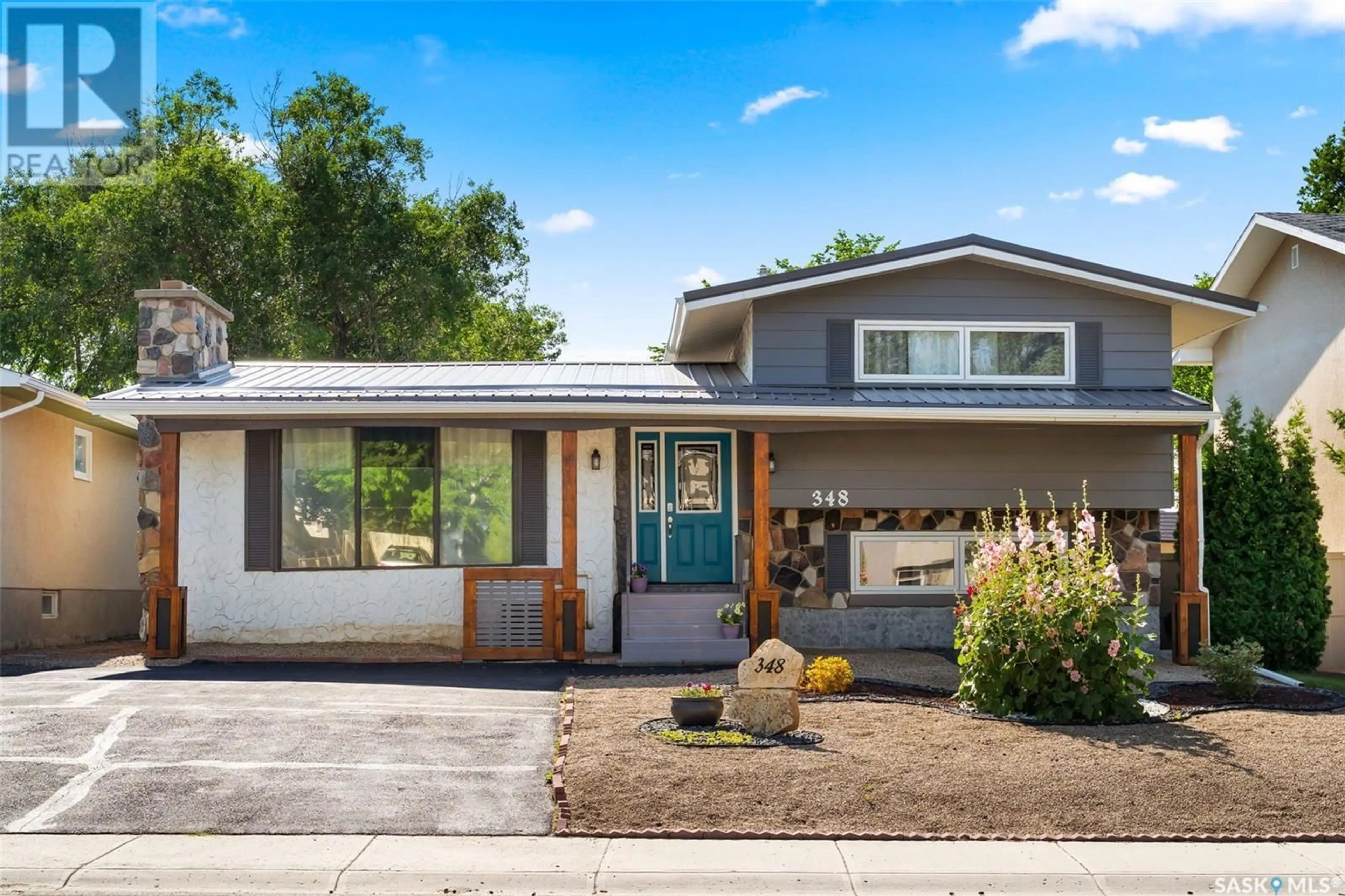 Home with vinyl exterior material, street for 348 ARTHUR STREET, Regina Saskatchewan S4R4X2