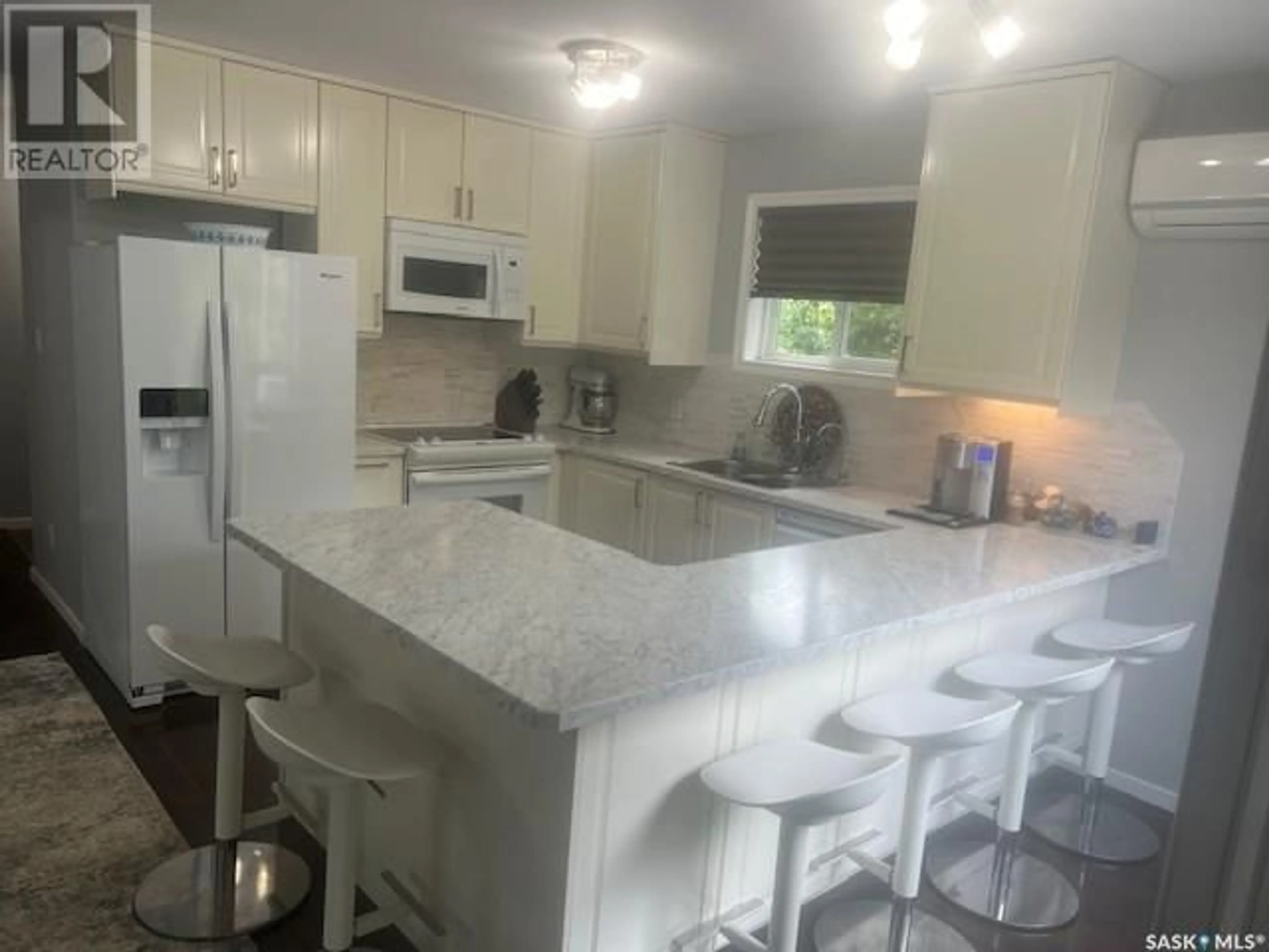 Open concept kitchen, ceramic/tile floor for 408 OLDROYD DRIVE, Good Spirit Lake Saskatchewan S0A0L0