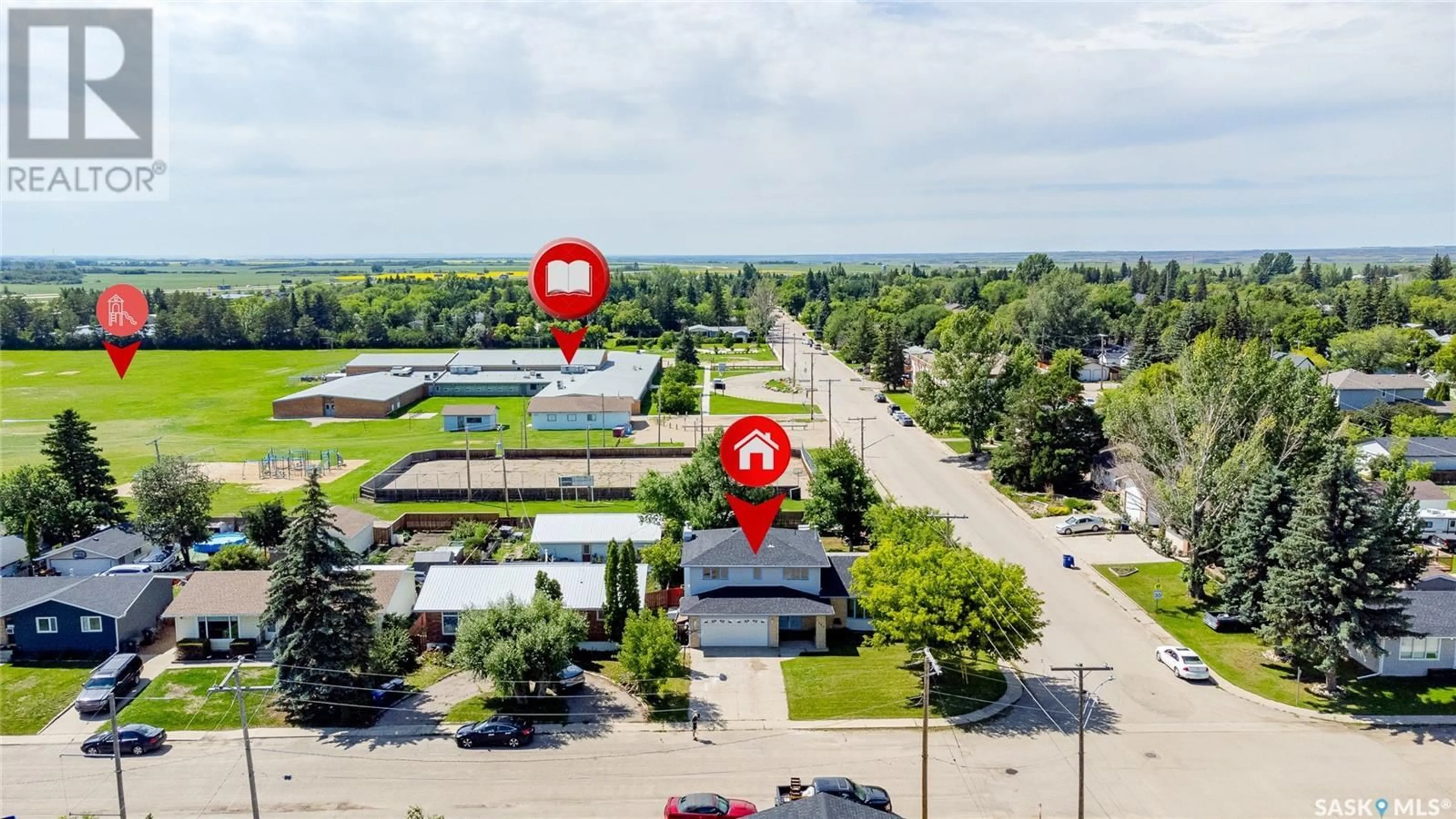 A pic from outside/outdoor area/front of a property/back of a property/a pic from drone, street for 302 4TH AVENUE, Langham Saskatchewan S0K2L0