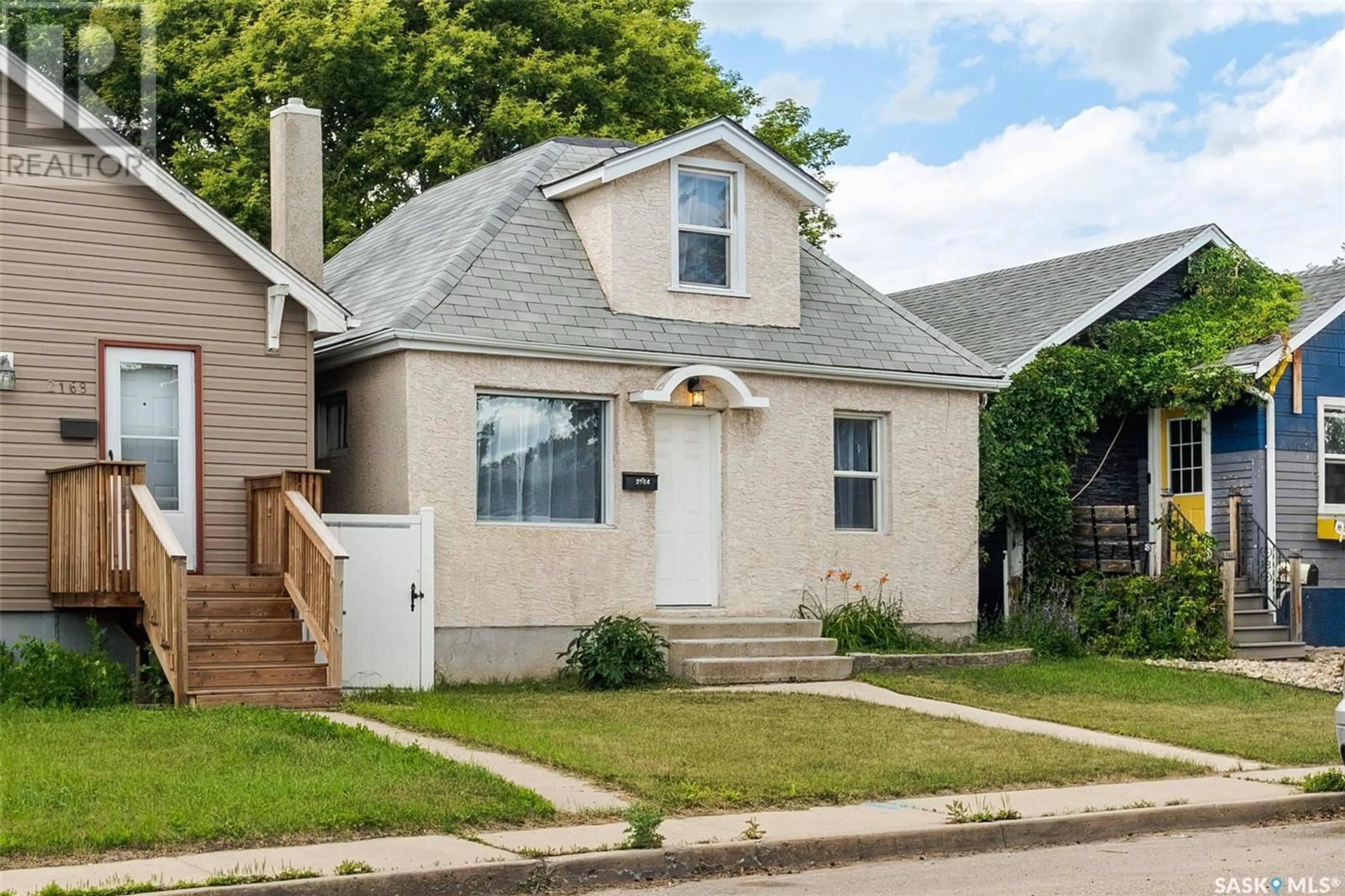 Home with vinyl exterior material, street for 2164 REYNOLDS STREET, Regina Saskatchewan S4N3N1