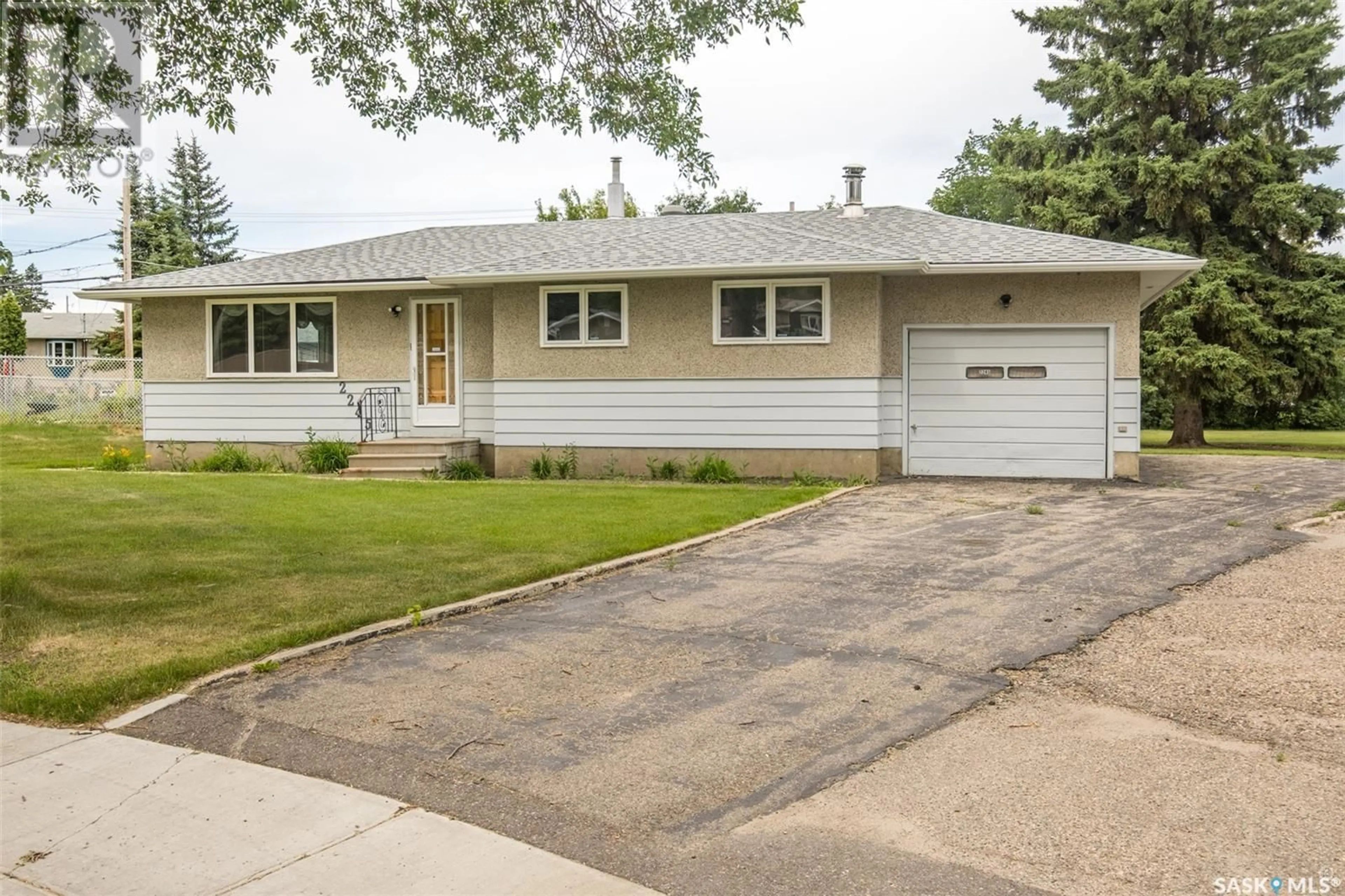 Home with vinyl exterior material, street for 2245 STEUART AVENUE, Prince Albert Saskatchewan S6V2V1