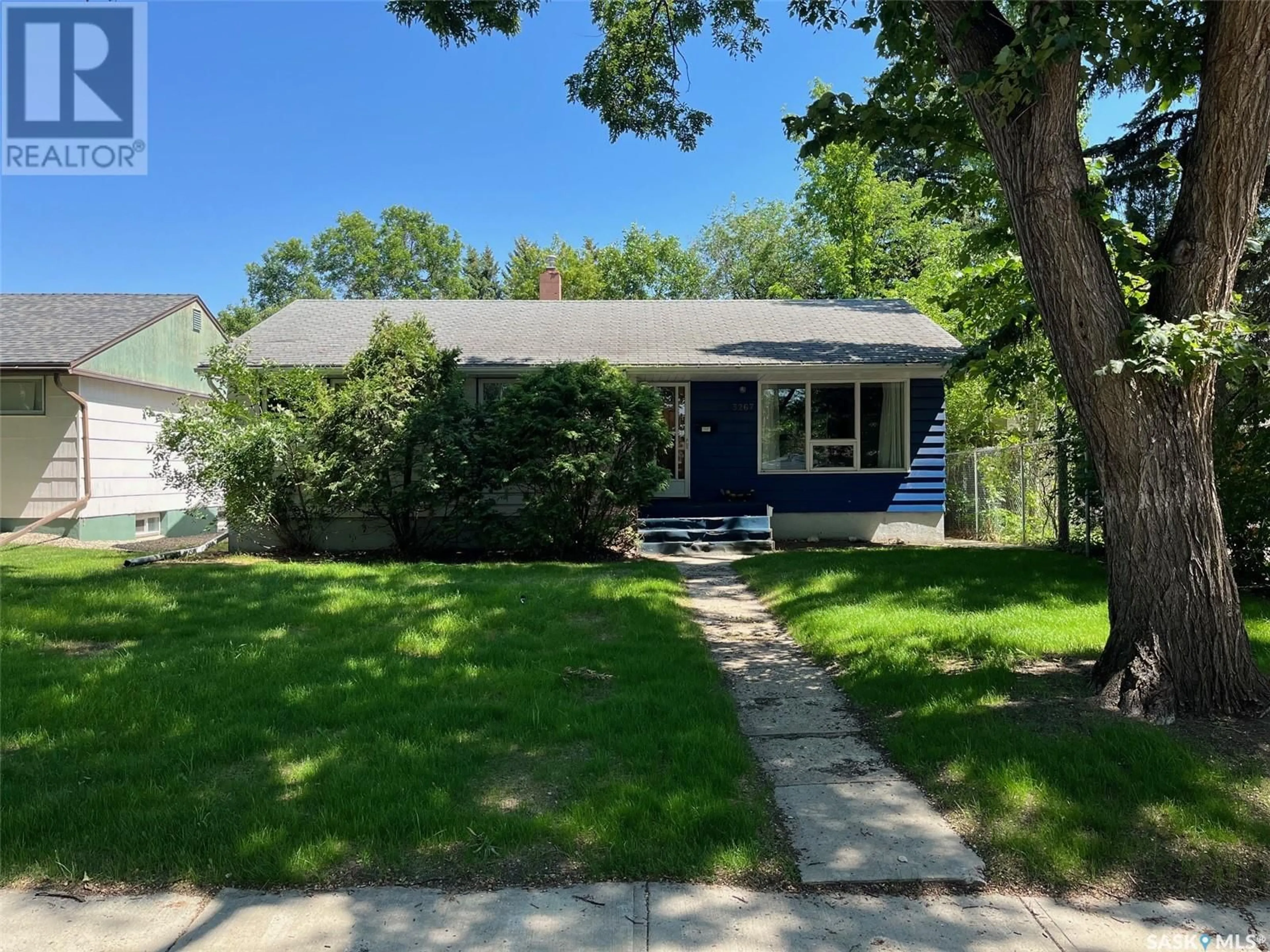 Home with vinyl exterior material, street for 3267 ATHOL STREET, Regina Saskatchewan S4S1Z1