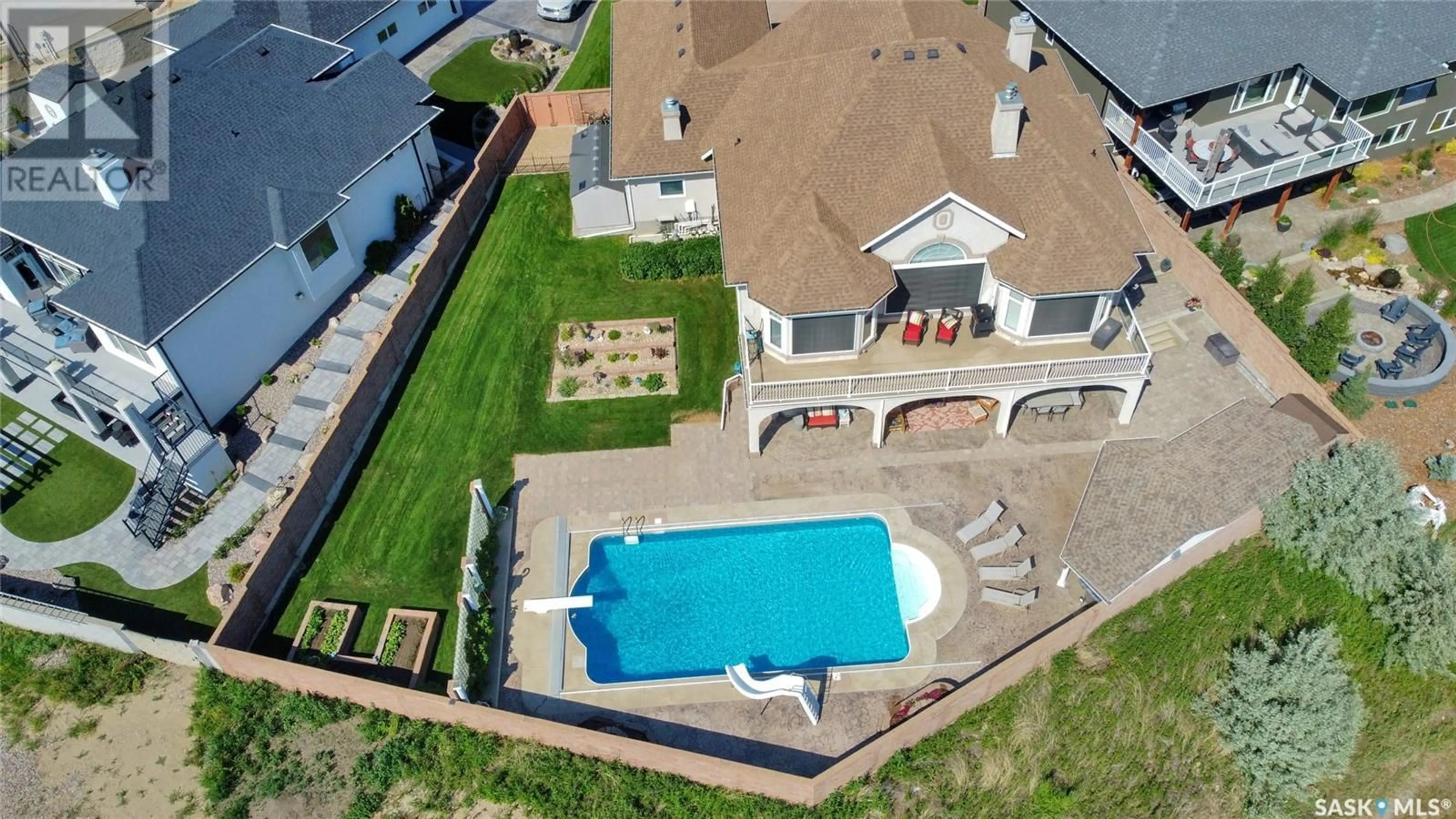 A pic from outside/outdoor area/front of a property/back of a property/a pic from drone, water/lake/river/ocean view for 1453 NORMANDY DRIVE, Moose Jaw Saskatchewan S6H6P1