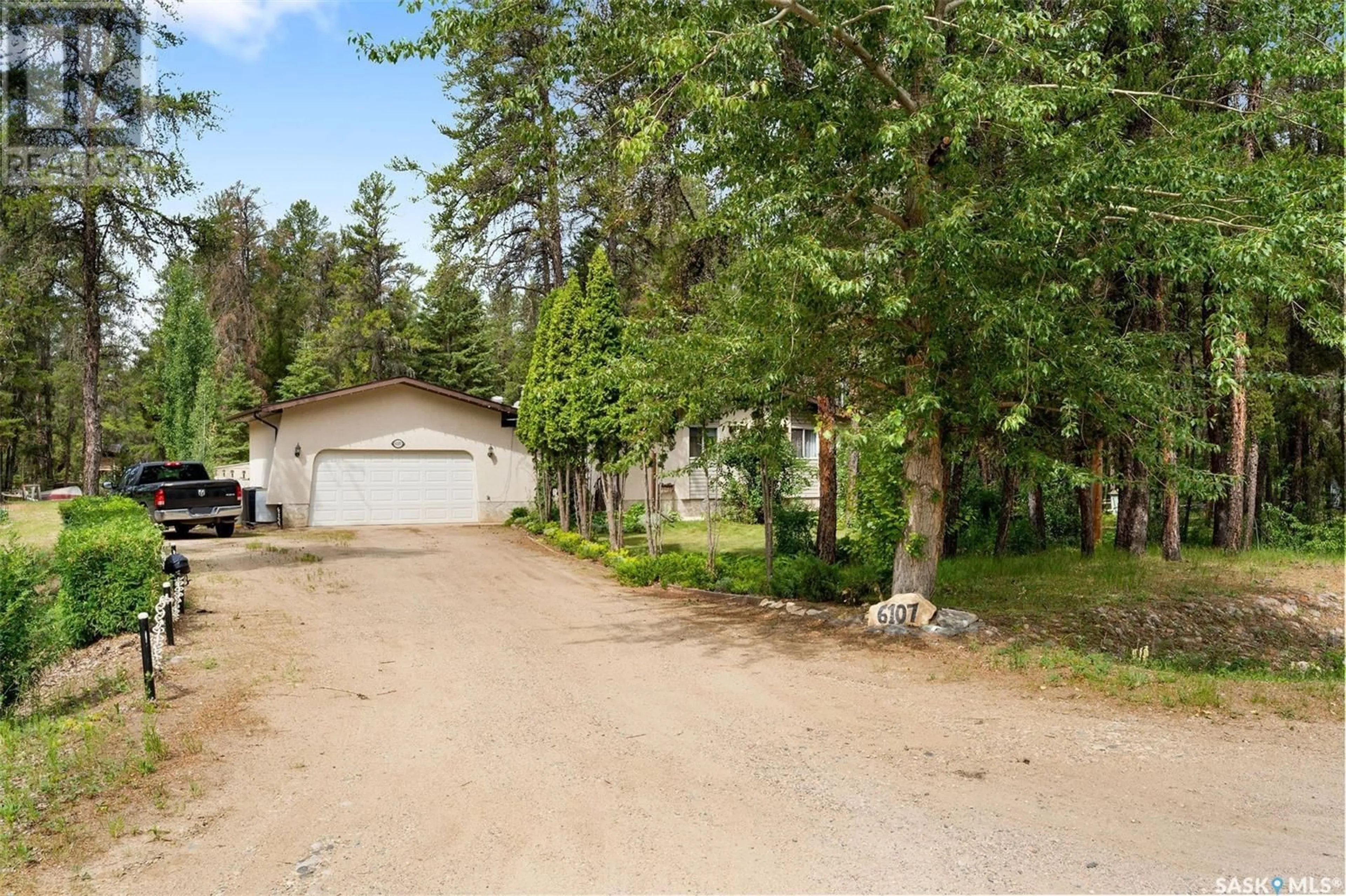 A pic from outside/outdoor area/front of a property/back of a property/a pic from drone, forest/trees view for 6107 HOLMES DRIVE, Buckland Rm No. 491 Saskatchewan S6V5R3
