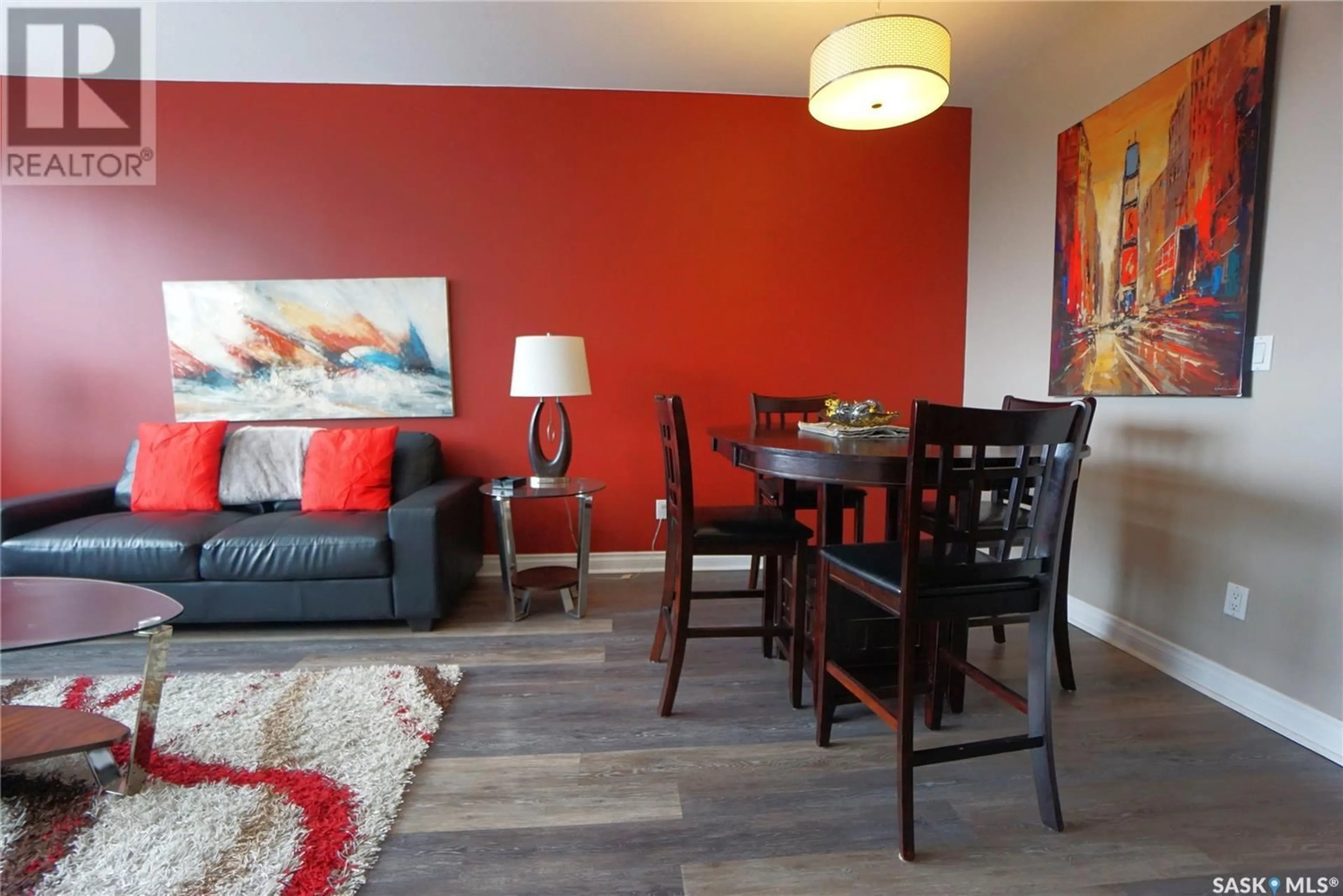 Living room with furniture, wood/laminate floor for 1867 - 1106 HAMILTON STREET, Regina Saskatchewan S4P2C2