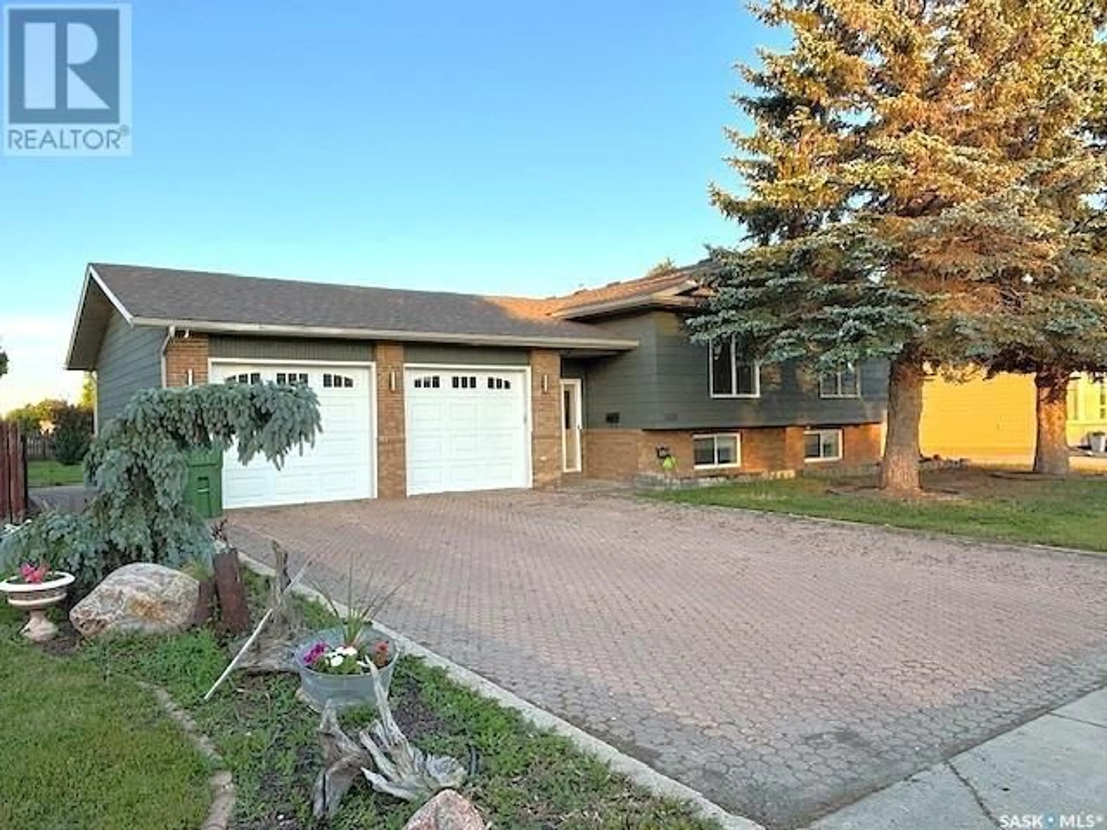 Home with brick exterior material, street for 1635 MARQUIS AVENUE, Moose Jaw Saskatchewan S6H7V3