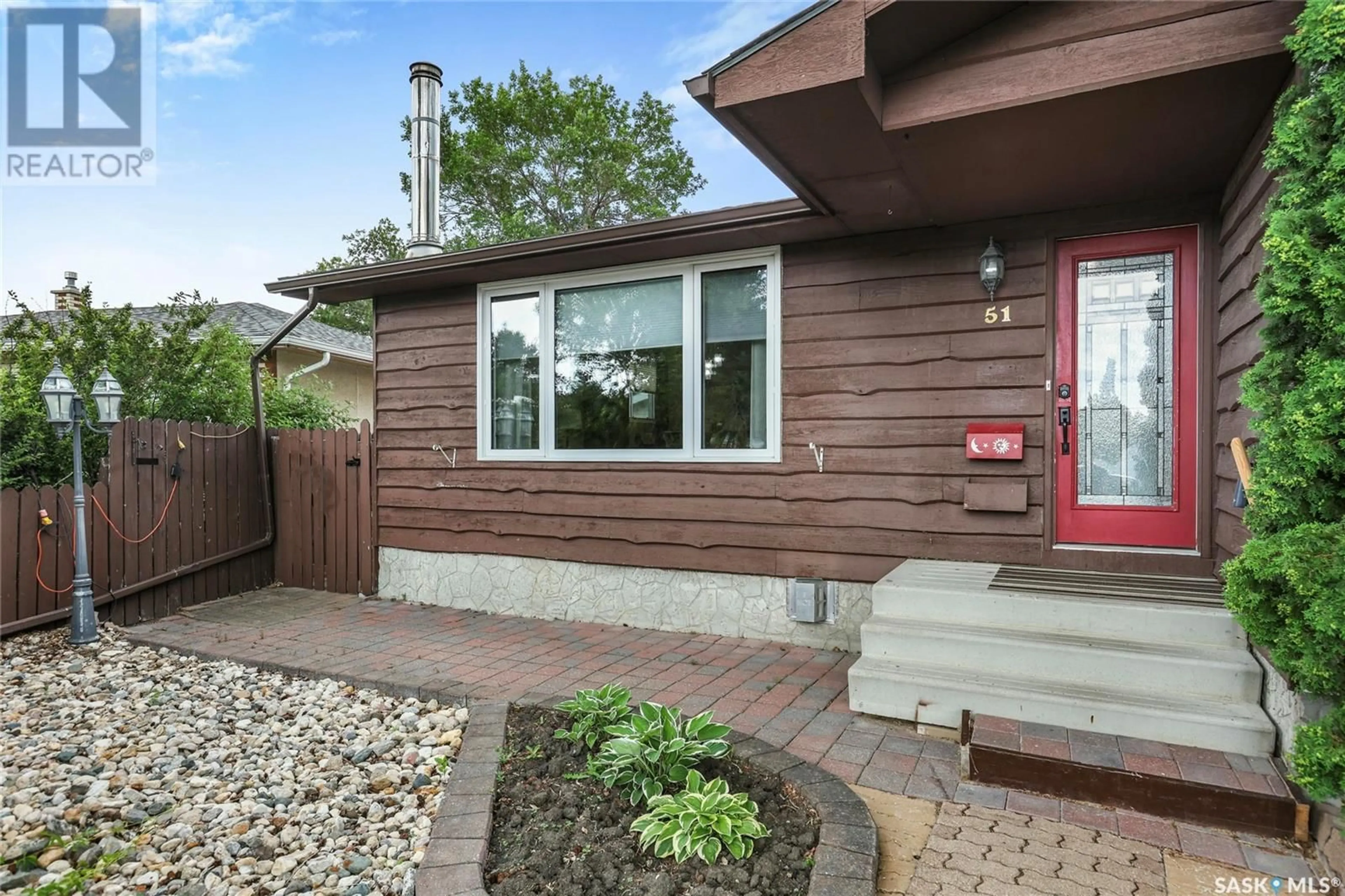 Home with vinyl exterior material, street for 51 HAYES CRESCENT, Regina Saskatchewan S4X1B1