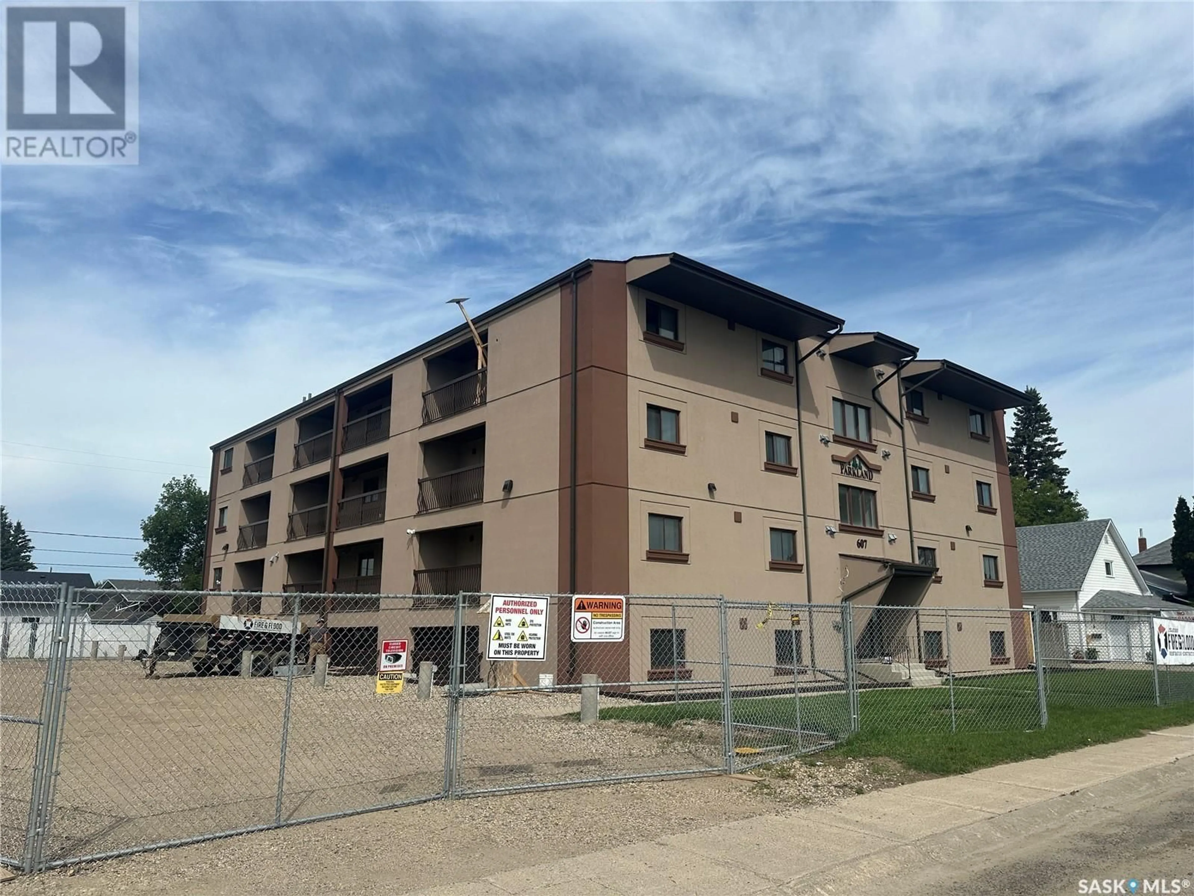 A pic from outside/outdoor area/front of a property/back of a property/a pic from drone, building for 405 607 10TH STREET, Humboldt Saskatchewan S0K2A0
