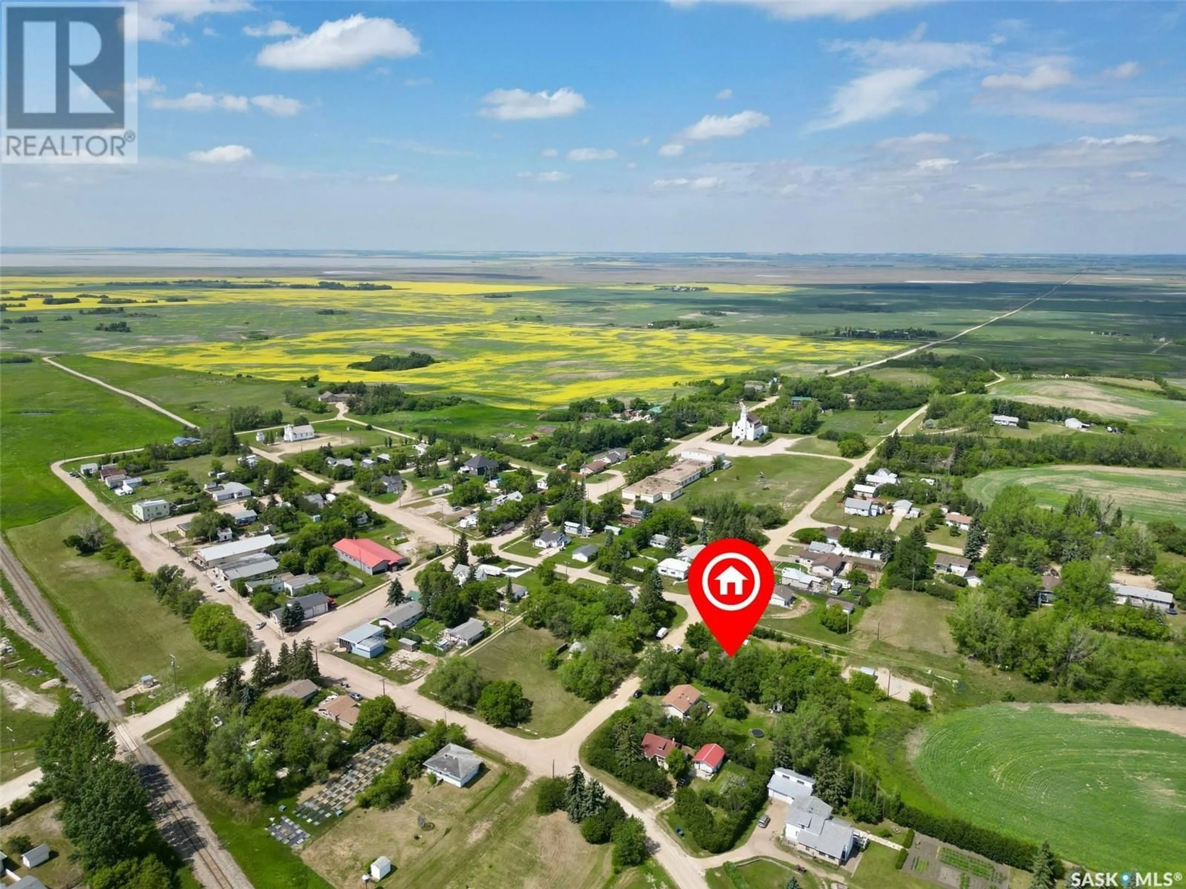 A pic from outside/outdoor area/front of a property/back of a property/a pic from drone, street for 48 HELENA STREET, Prud'homme Saskatchewan S0K3K0