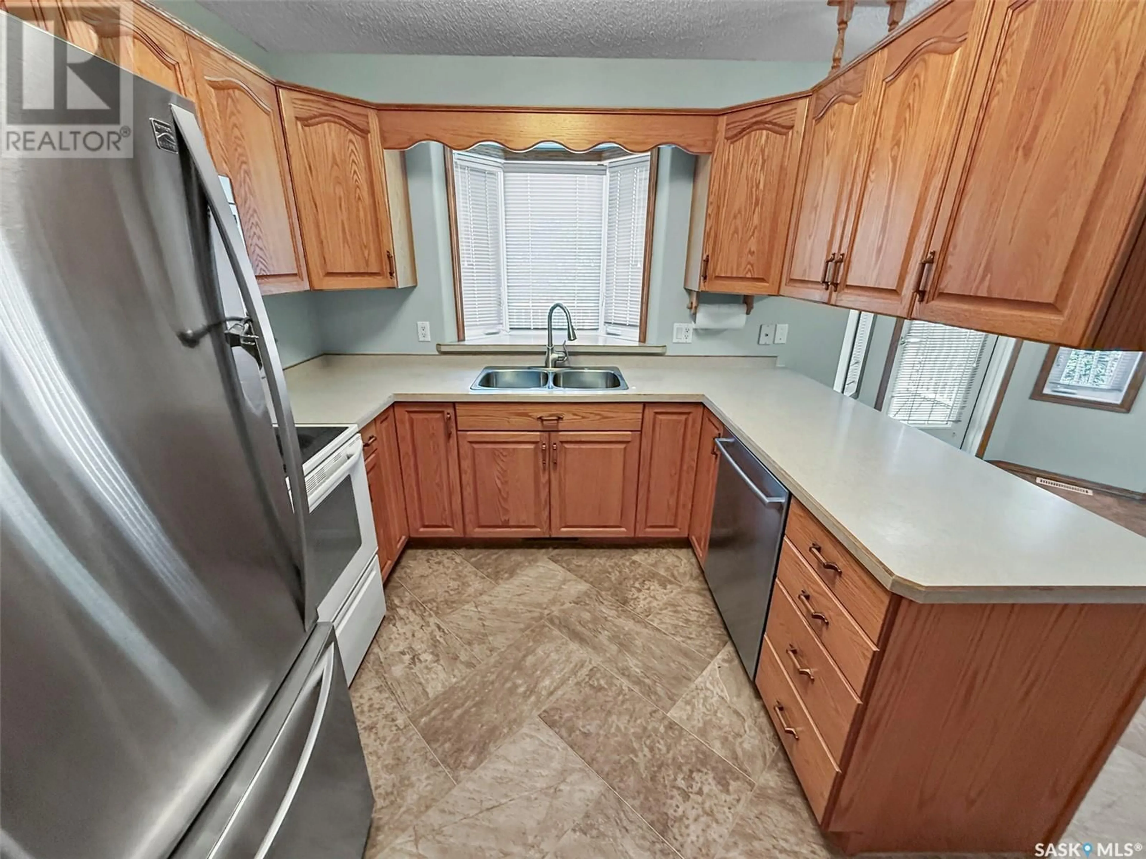 Standard kitchen, ceramic/tile floor for 410 2ND STREET, Kyle Saskatchewan S0L1T0