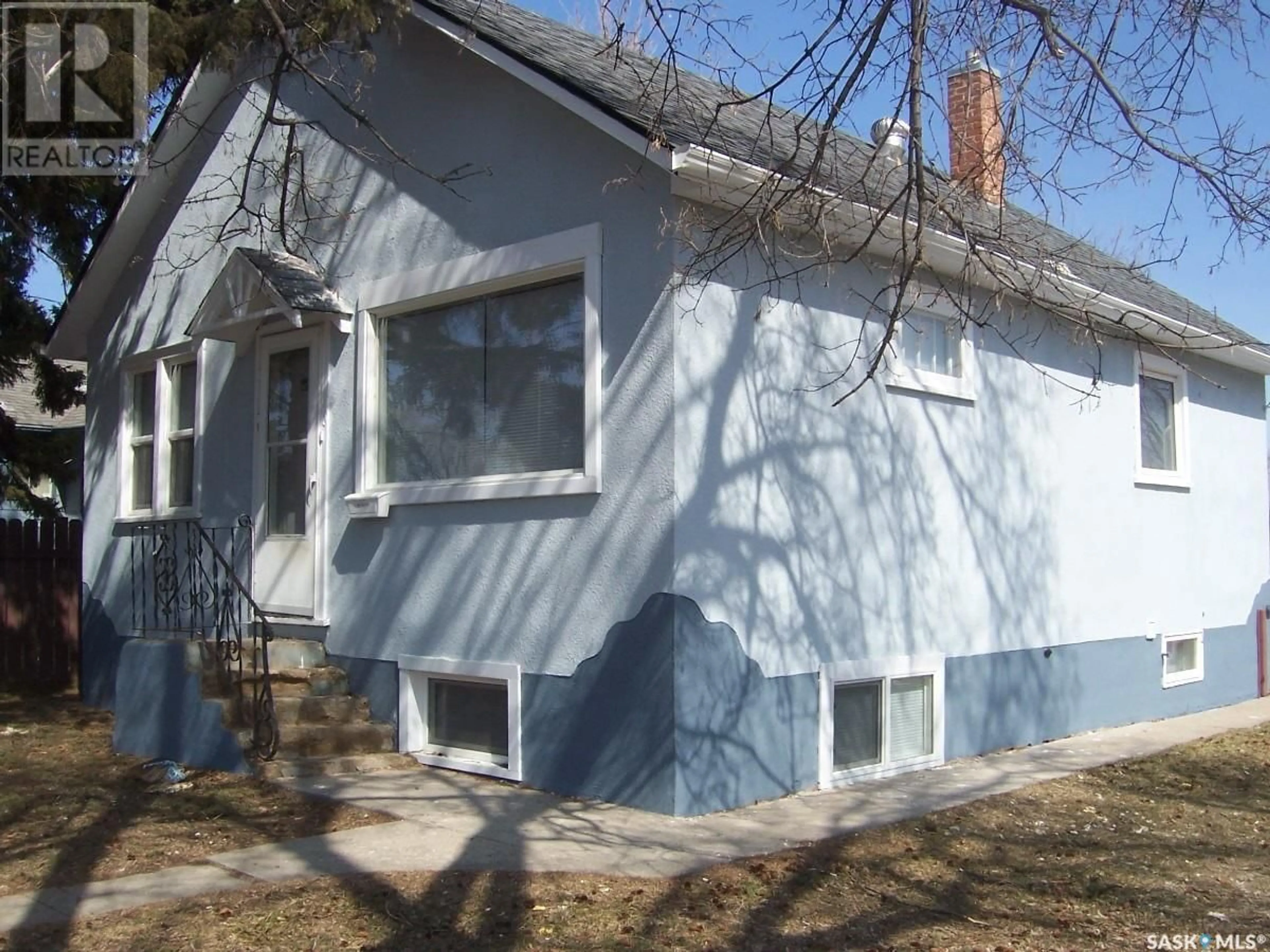 Home with vinyl exterior material, street for E - 630 5TH AVENUE, Prince Albert Saskatchewan S6V2H5