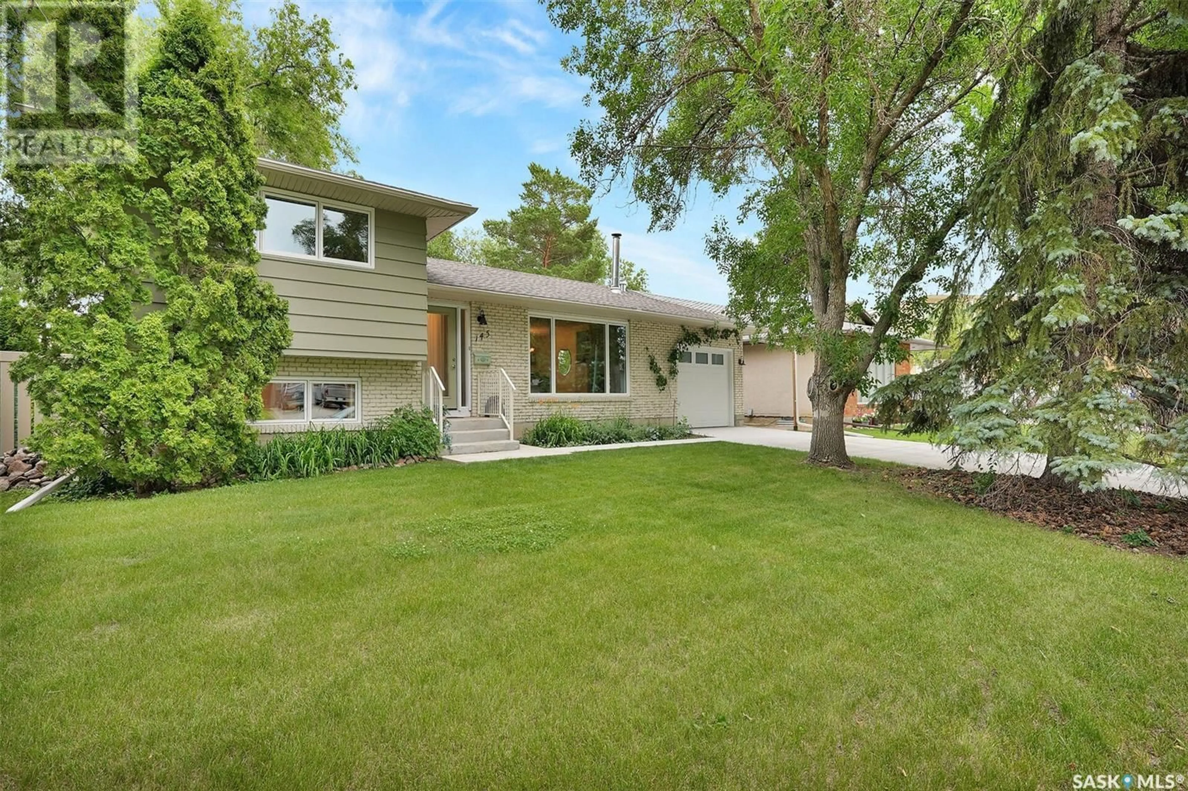 Home with vinyl exterior material, street for 145 DAVIDSON CRESCENT, Regina Saskatchewan S4S4T2