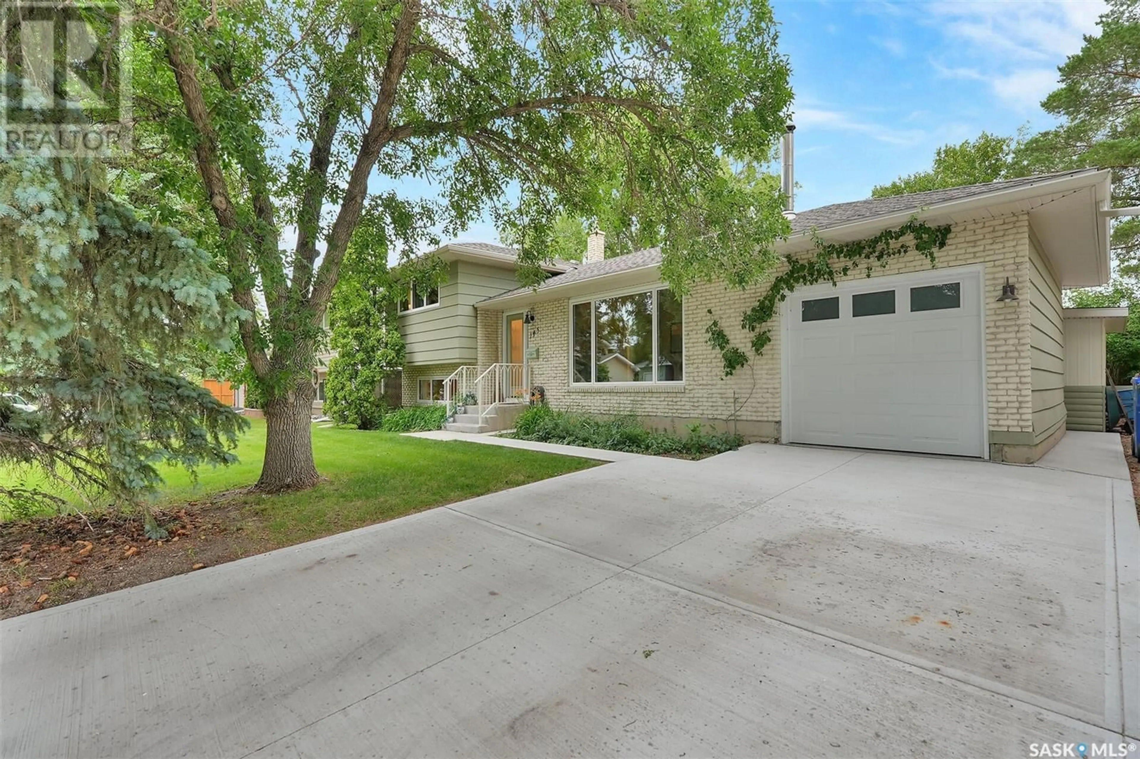 Home with brick exterior material, street for 145 DAVIDSON CRESCENT, Regina Saskatchewan S4S4T2