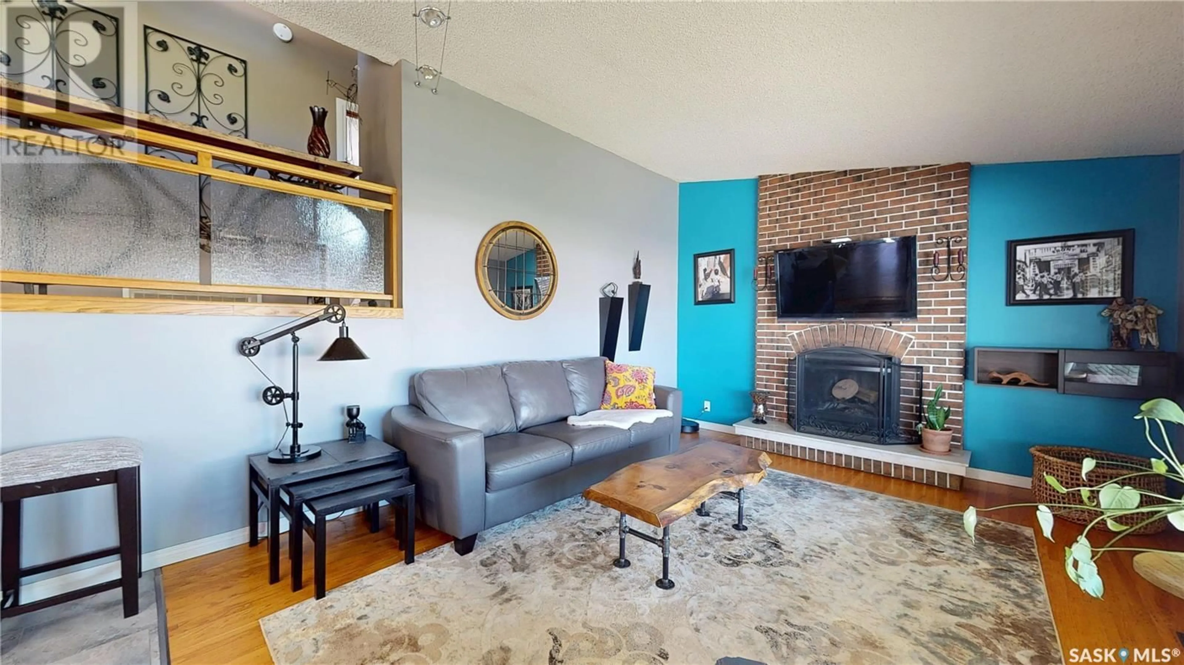 Living room with furniture, unknown for 102 MCINNIS CRESCENT, Regina Saskatchewan S4R3E8