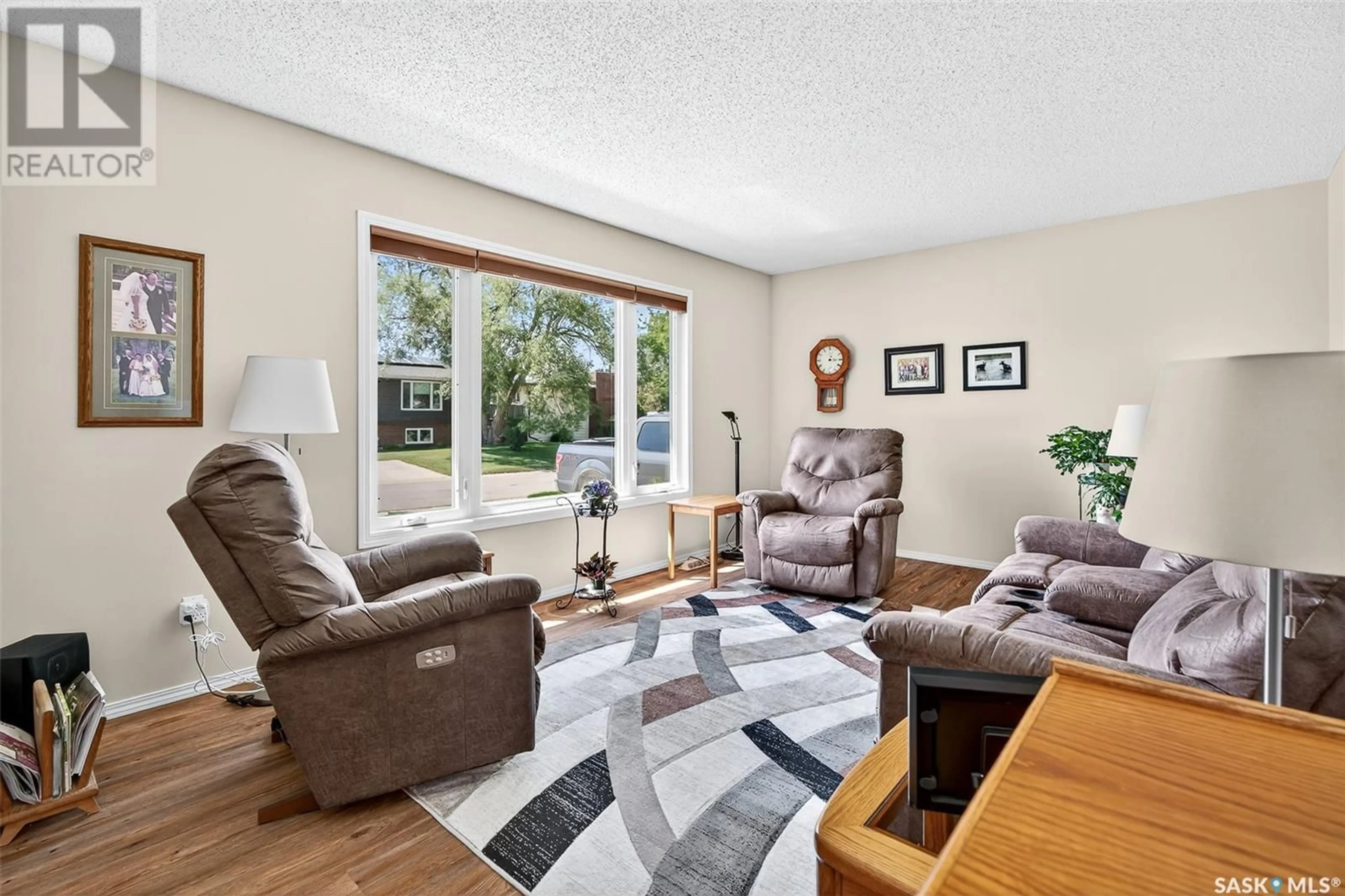 Living room with furniture, unknown for 986 HOLDSWORTH CRESCENT, Moose Jaw Saskatchewan S6H6T8